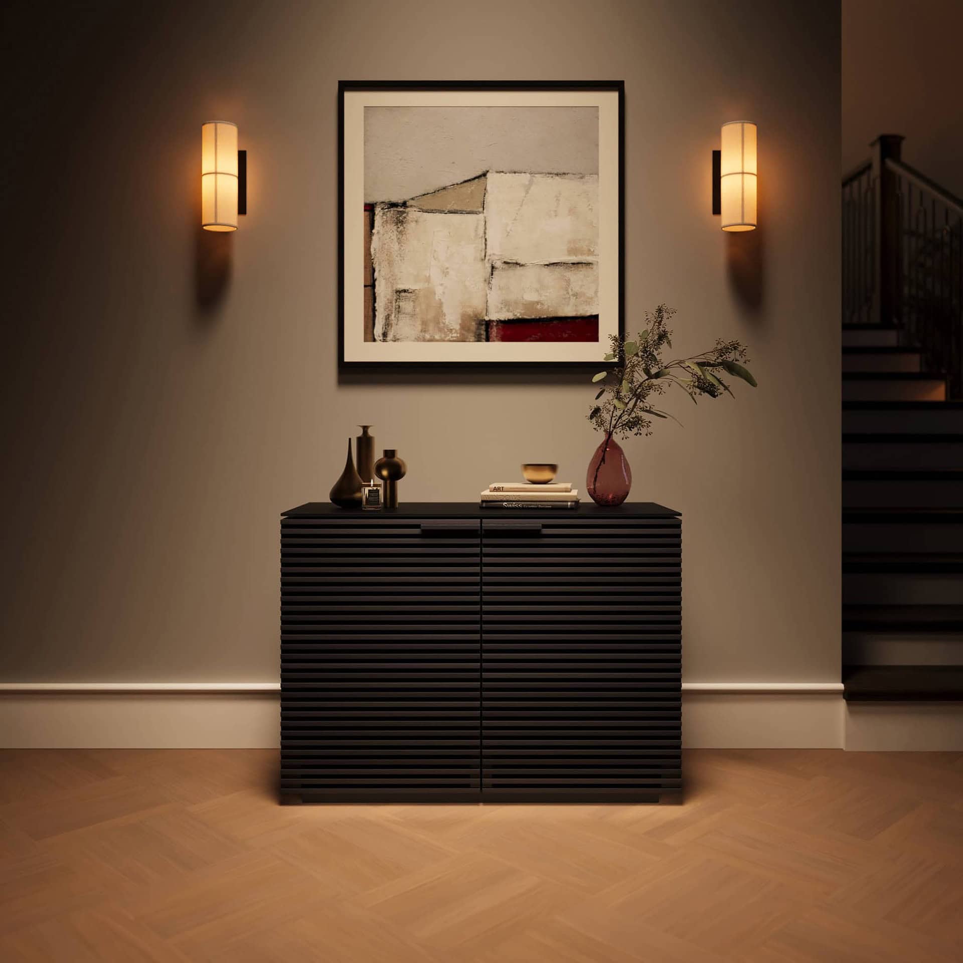 Elegant black modern sideboard with decorative vases and artwork, stylish lighting, perfect for contemporary interiors.