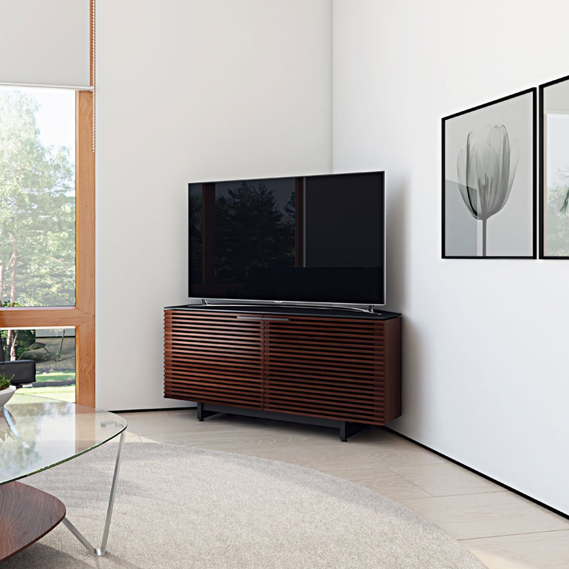 Elegant wooden media console in modern living room for stylish TV setup and storage.