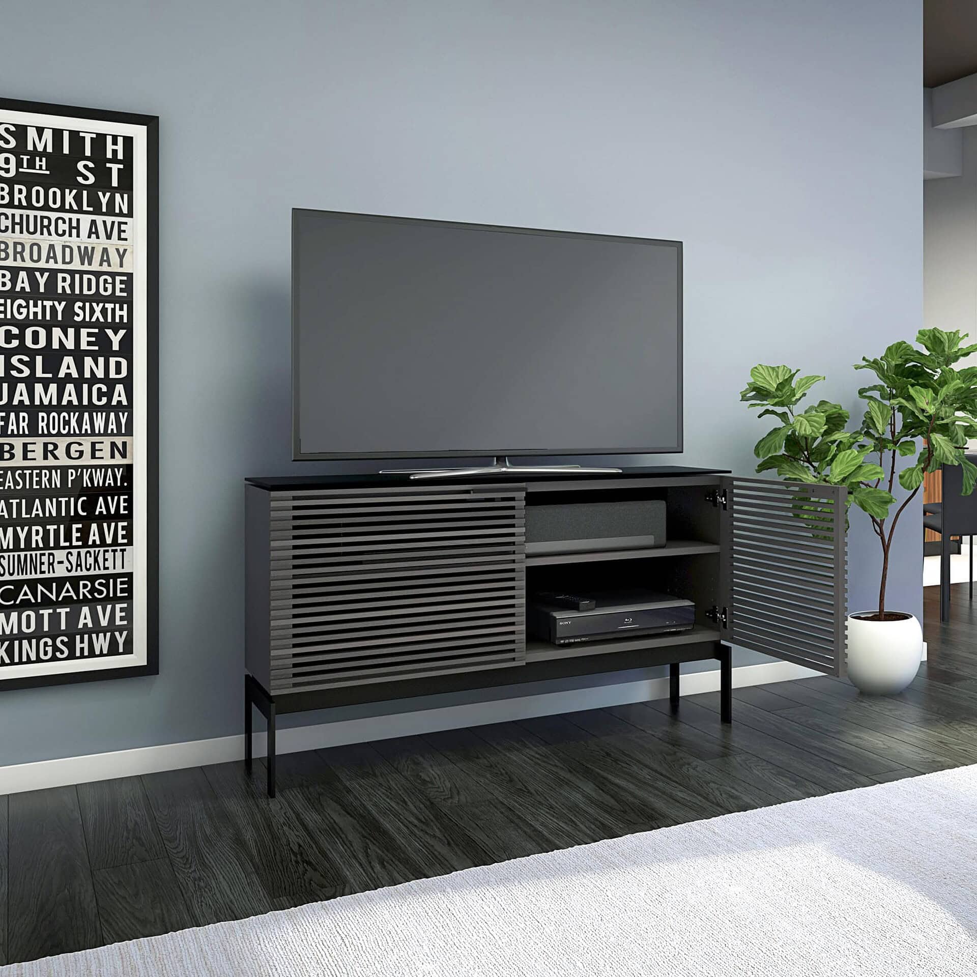 Sleek black modern TV console with slatted doors, perfect for stylish living rooms.