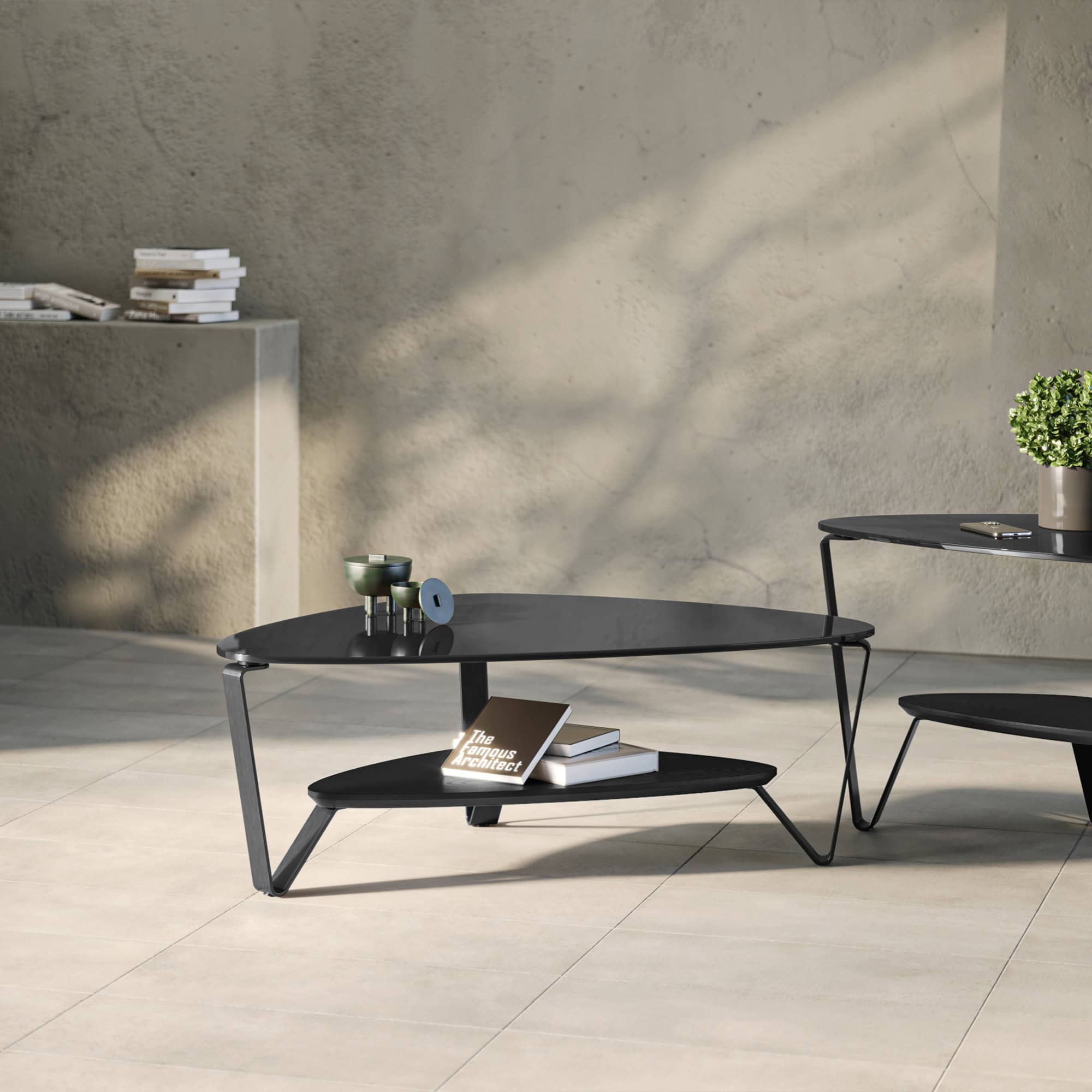Sleek black modern coffee table with minimalist design, perfect for contemporary living spaces.