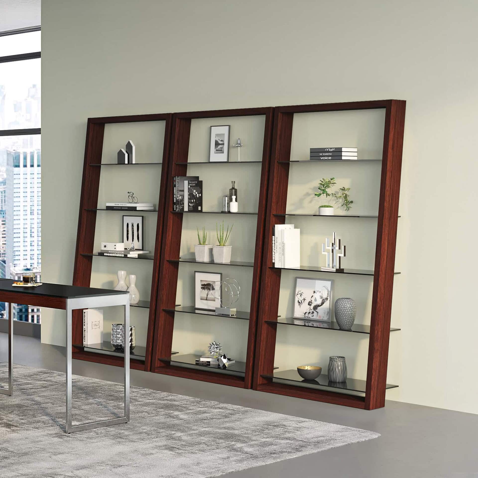 Sleek three-panel wooden and glass bookshelf with decorative accents and modern design.
