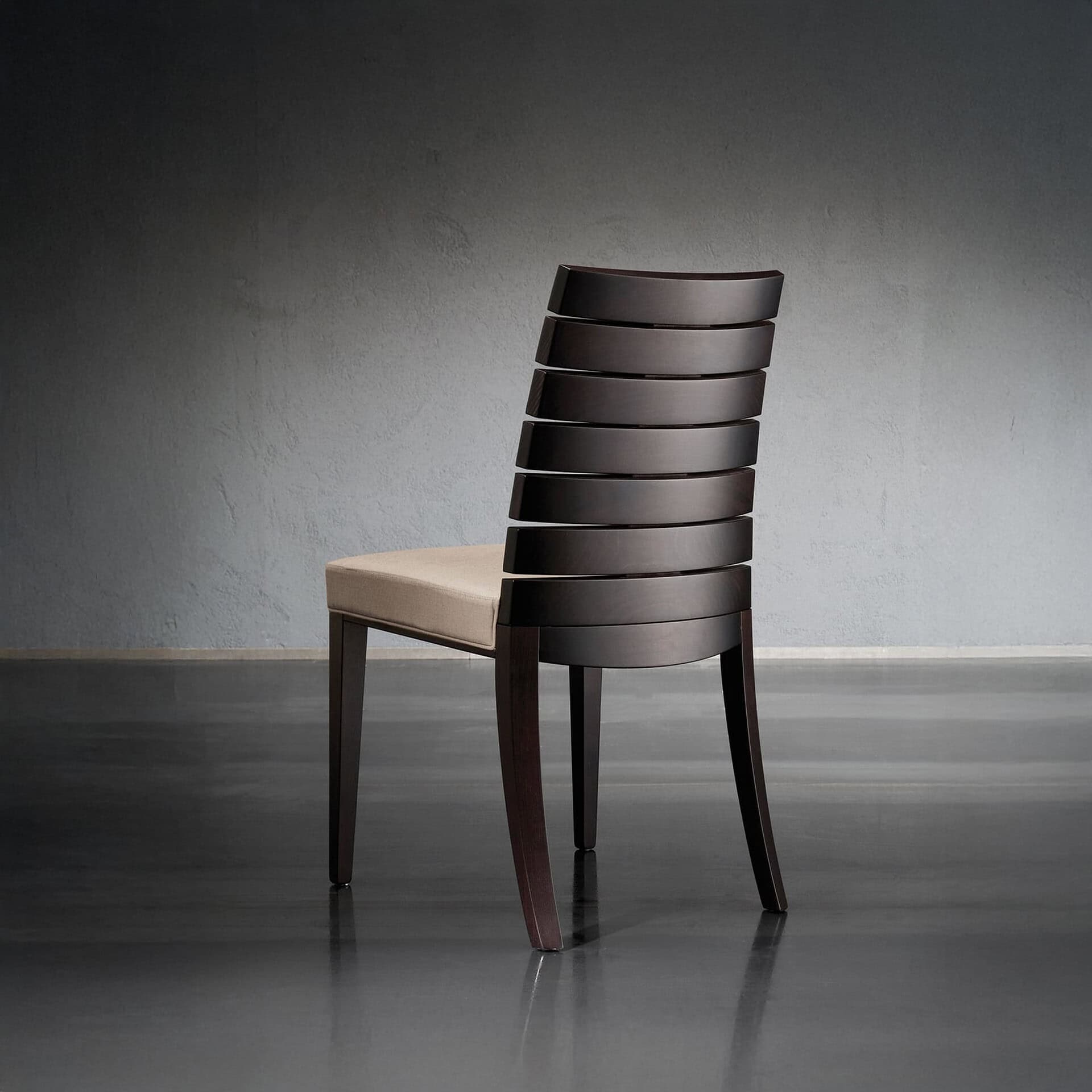 Stylish dining chair featuring layered wooden slats and a comfortable upholstered seat for contemporary homes.