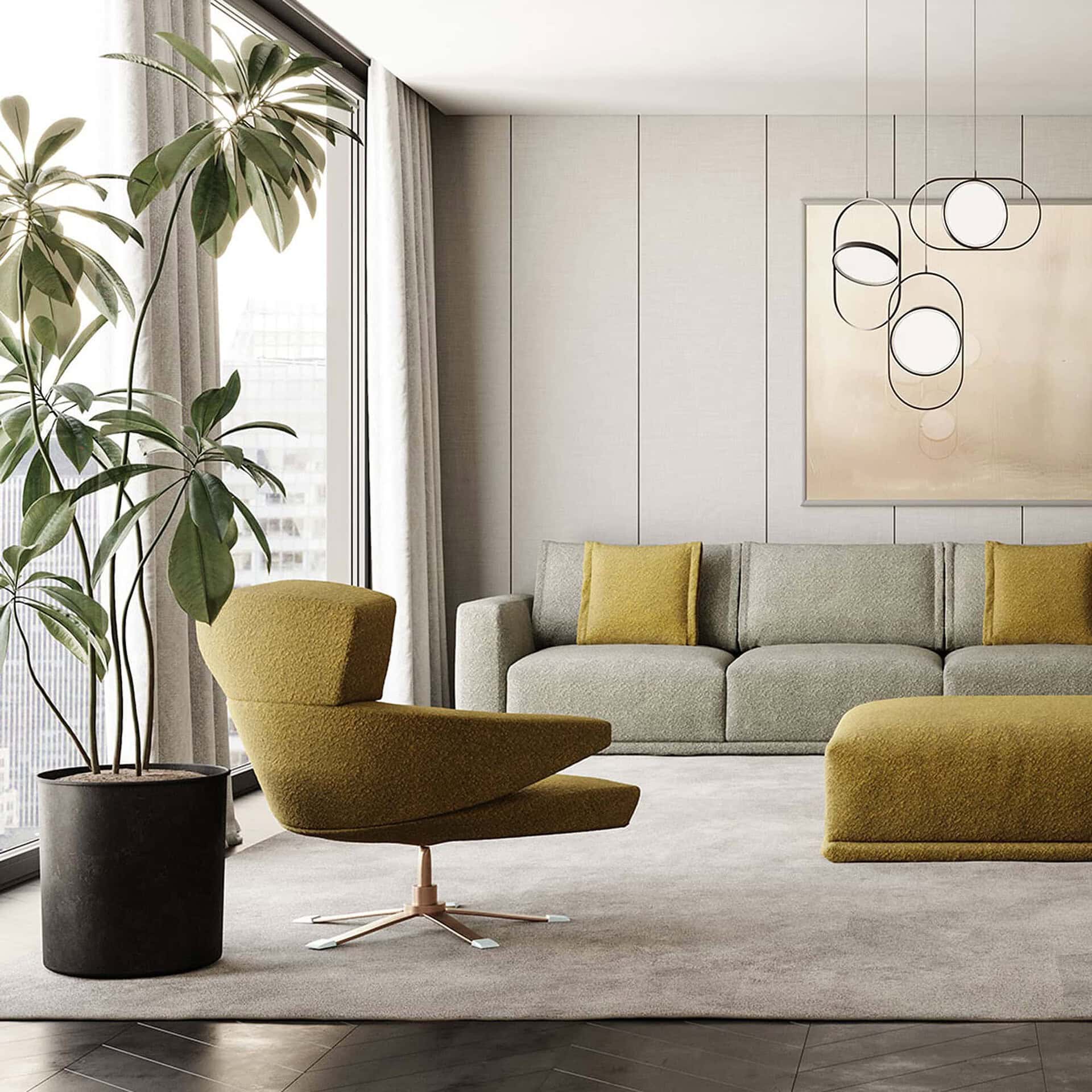 Mary Armchair in a modern living room setting with green upholstery and matching ottoman.