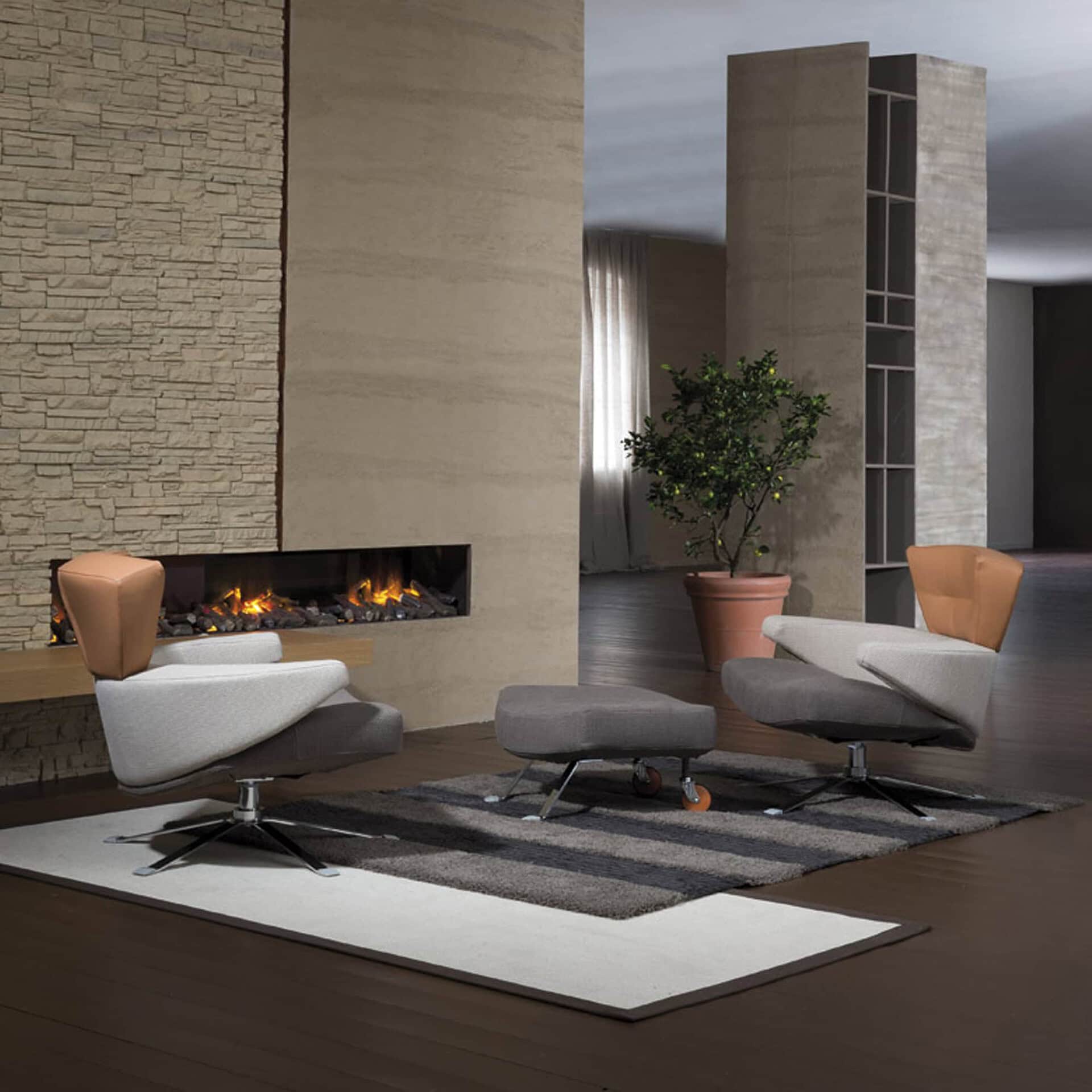 Mary Armchair in orange fabric with ottoman, styled in a contemporary interior.