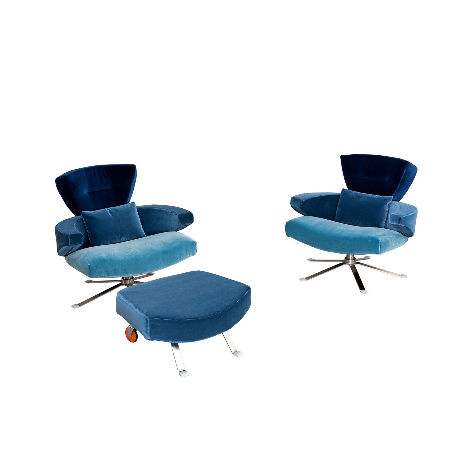 Pair of Mary Armchairs in blue fabric with matching ottomans against a white background.