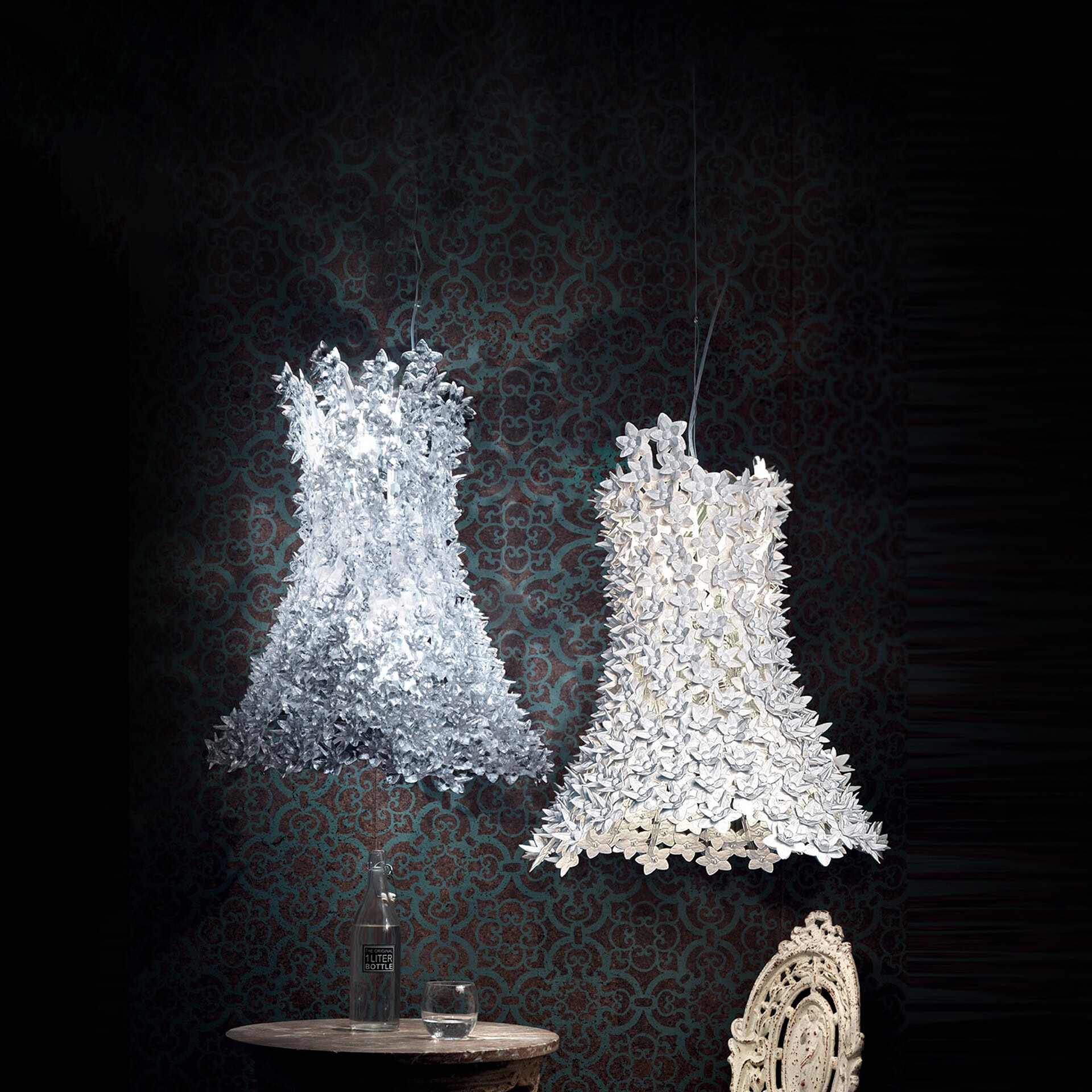 Floral pendant lights with intricate flower designs hanging in a stylish living space.