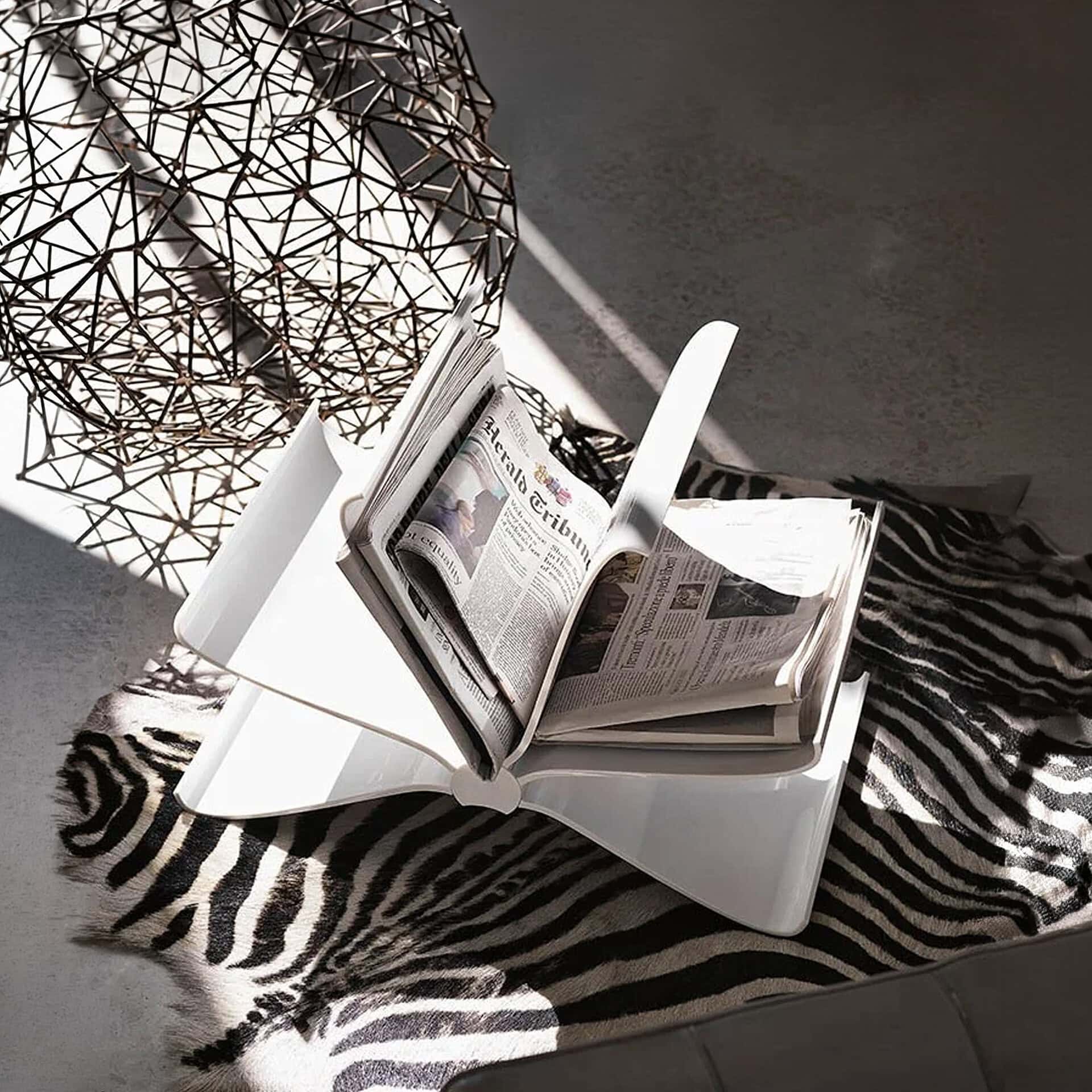 Magazine rack for stylish home organization and decor.