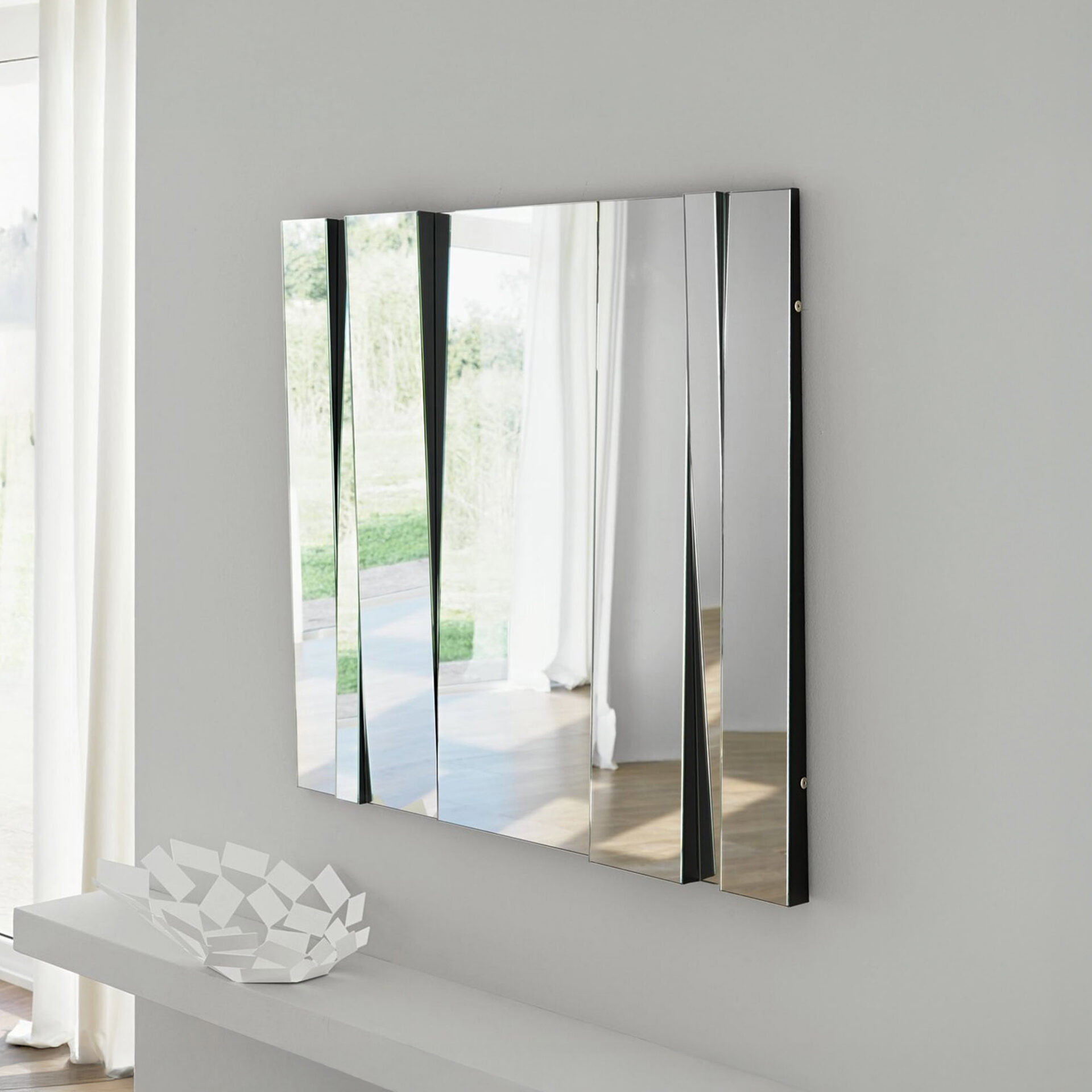 Fittipaldi Mirror in a bright modern interior with clear reflection.