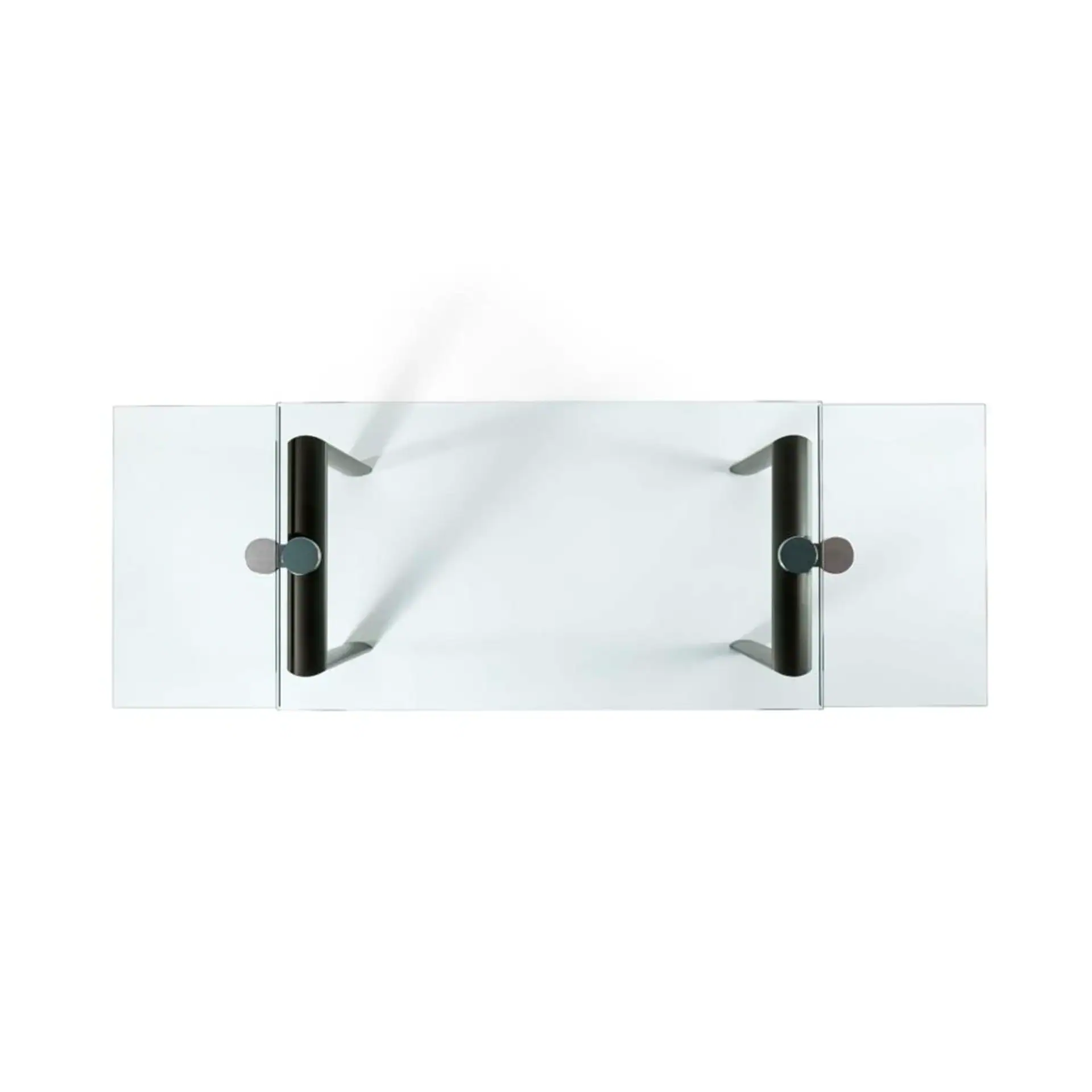 Modern extendable glass dining table with black metal handles.