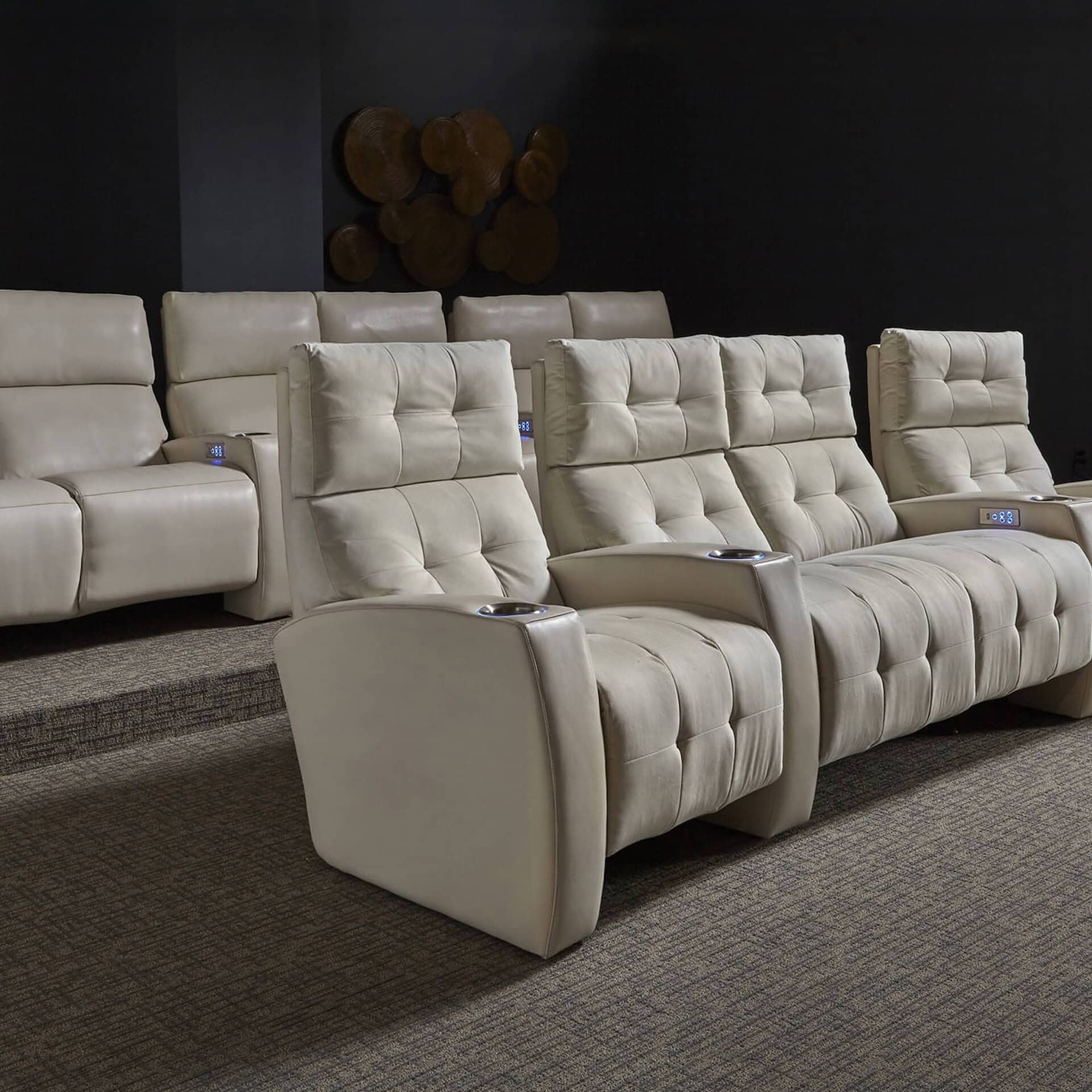 American Leather Monroe Home Theater Recliners in ivory leather with LED cup holders, lifestyle view