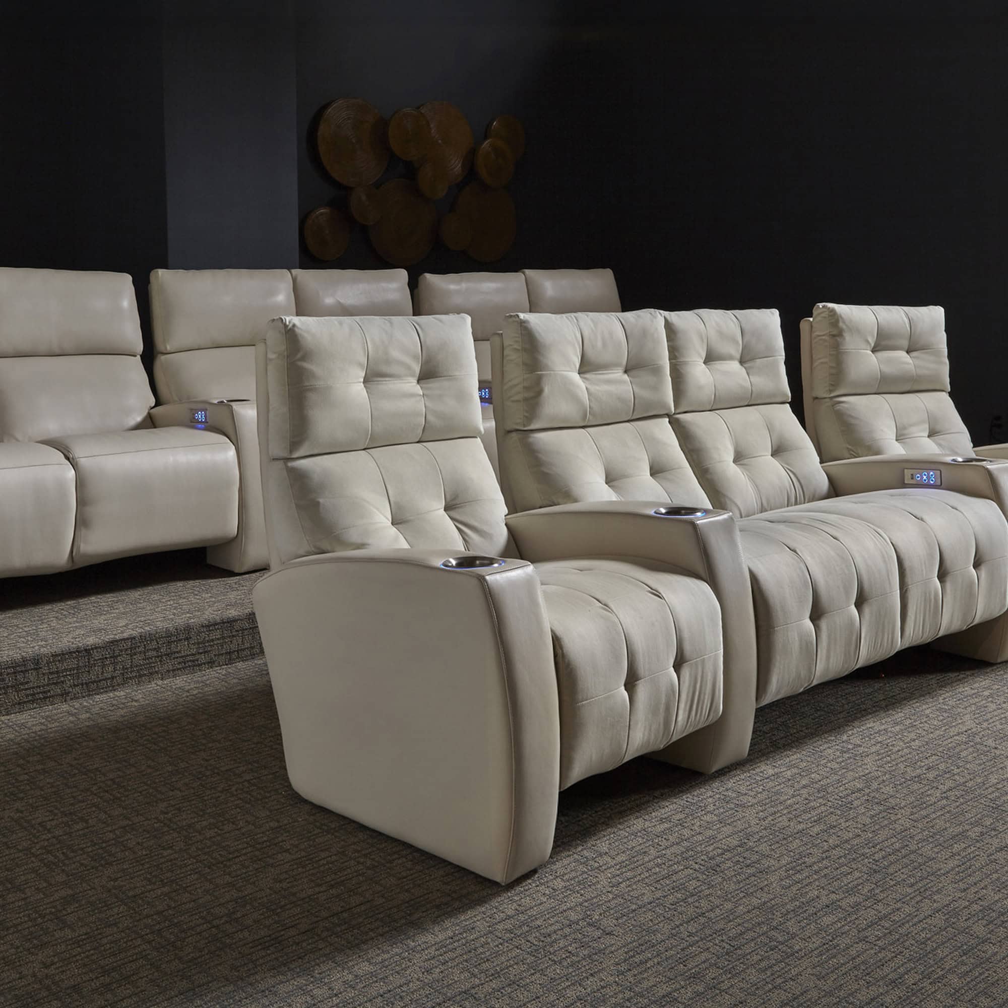 American Leather Monroe Home Theater Recliners in ivory leather with LED cup holders, lifestyle view