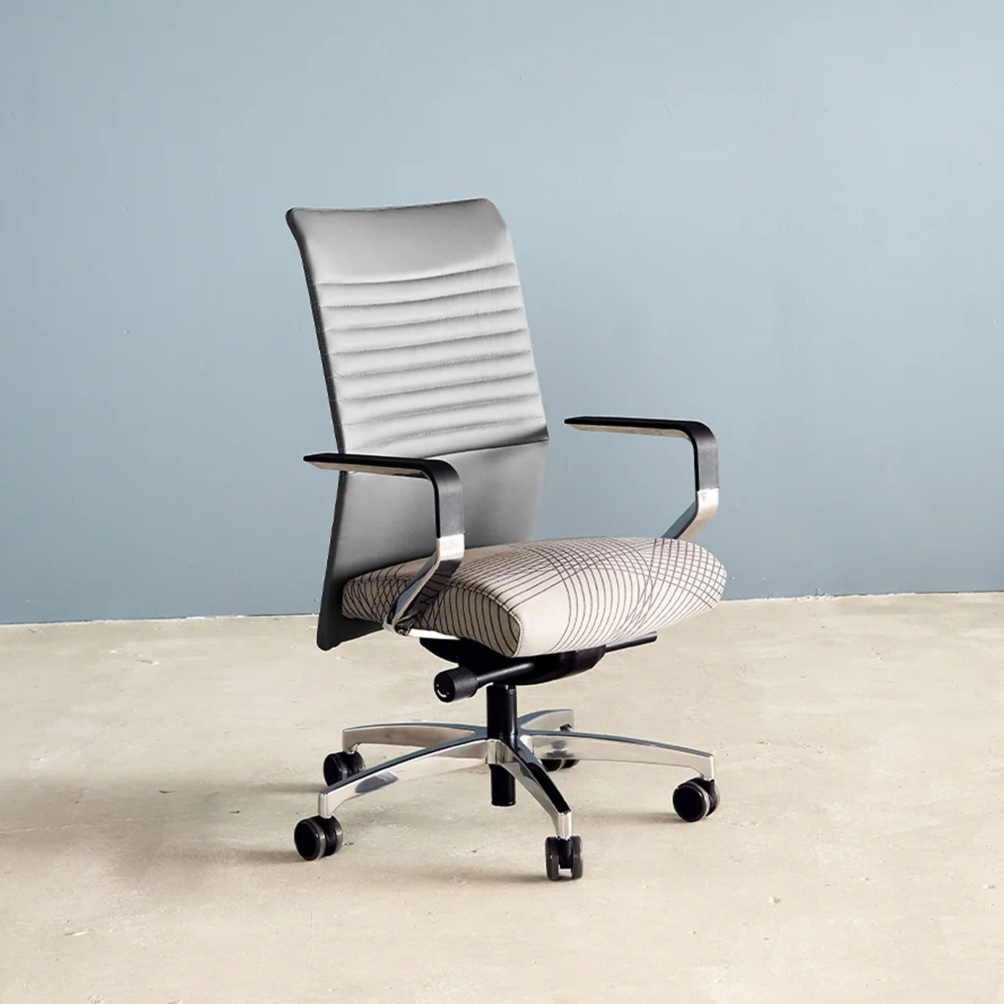 Side angle of Proform® Conference Chair with mesh back and seat