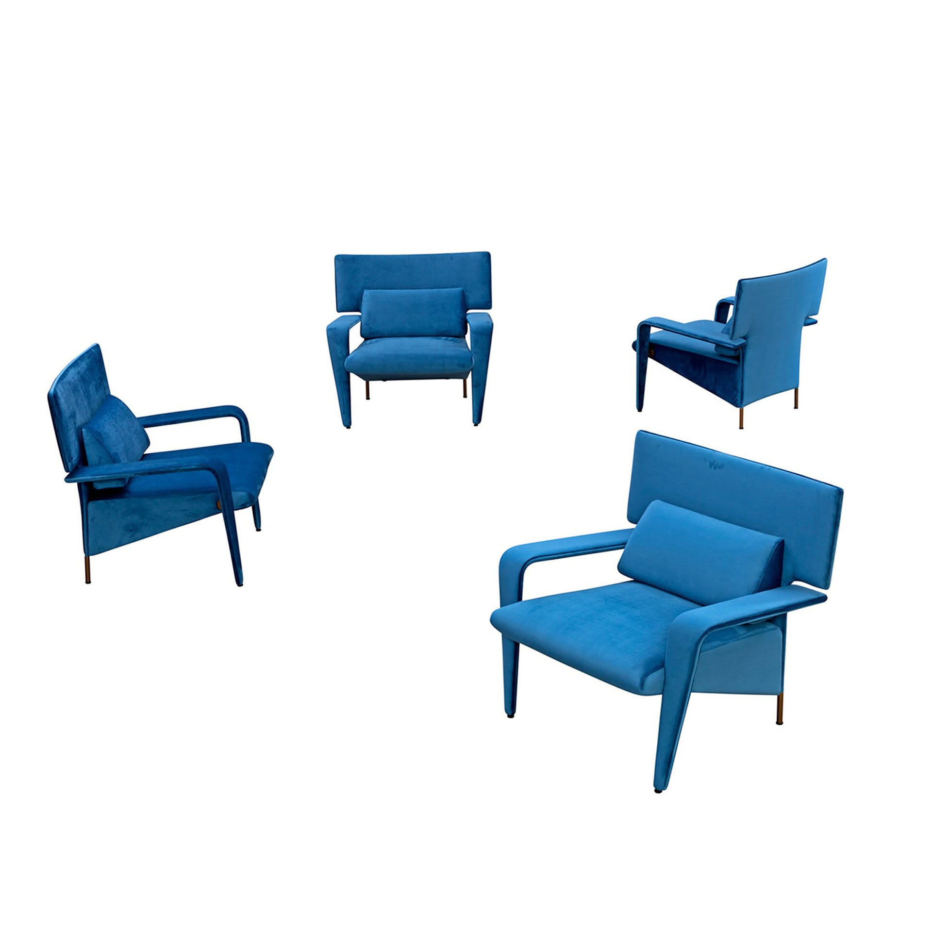 Group of four Mind Armchairs upholstered in bold blue fabric, arranged in different positions to showcase multiple angles.