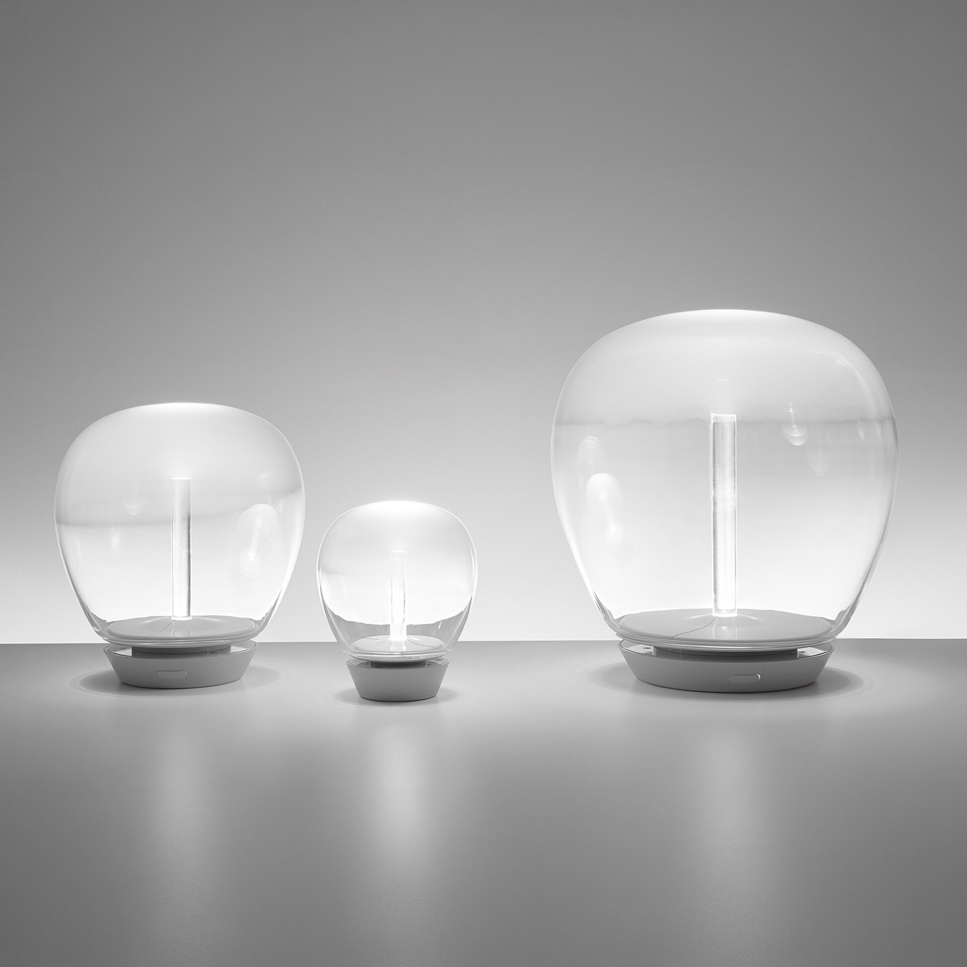 Empatia Glass Table Lamp with modern, minimalist design for elegant home decor.