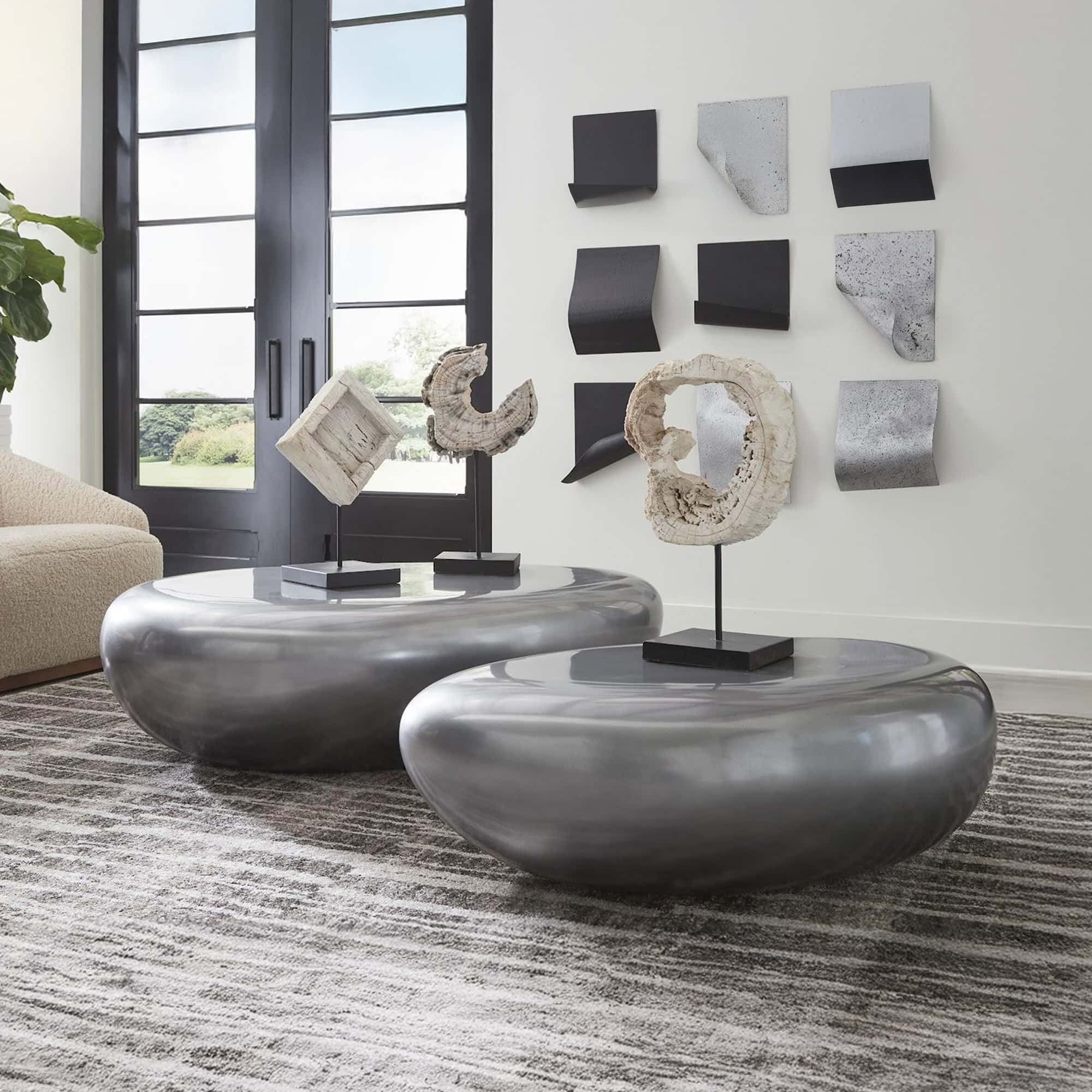 Polished Aluminum River Stone Coffee Table in modern loft-style space.