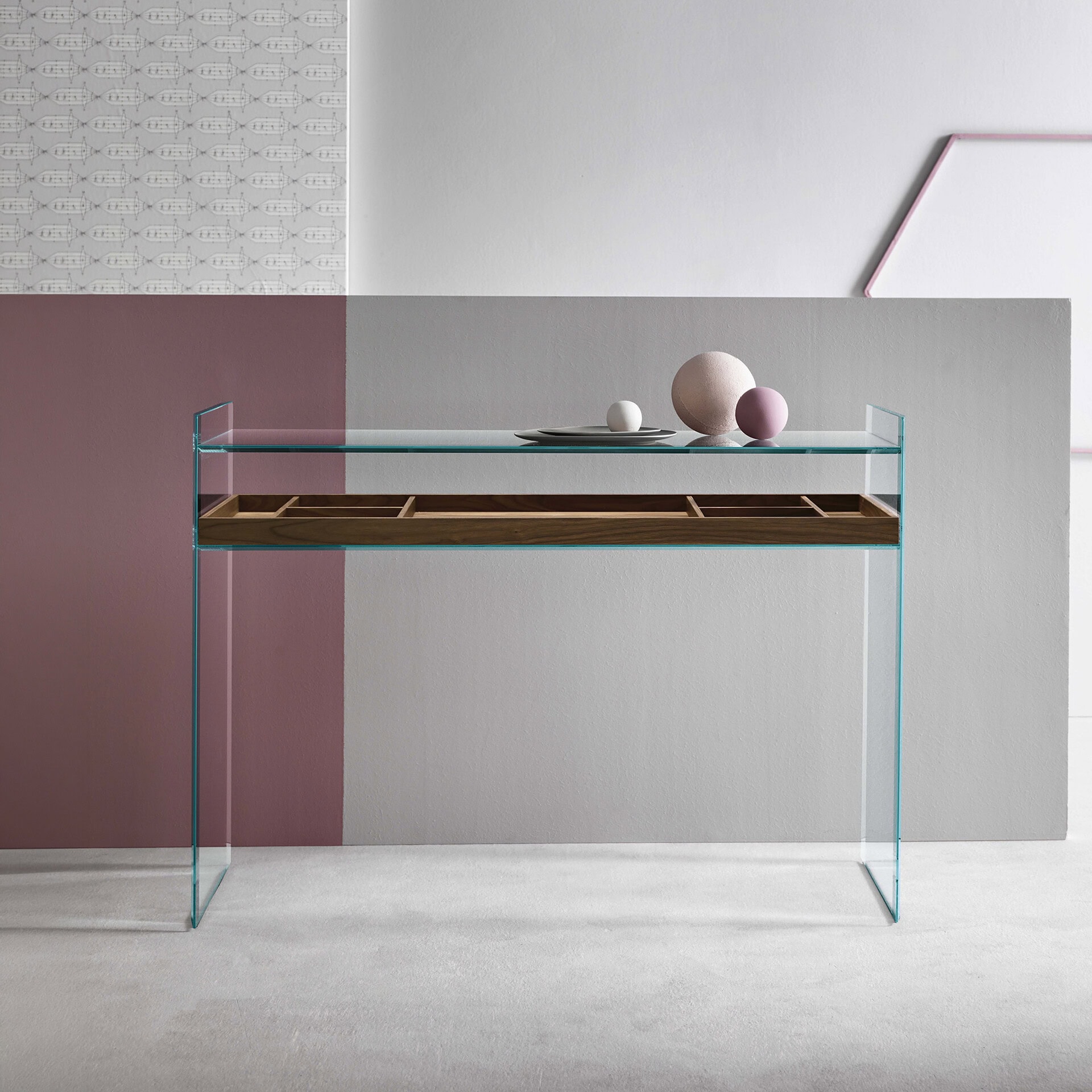 Glass console table with wooden shelf for modern home decor.