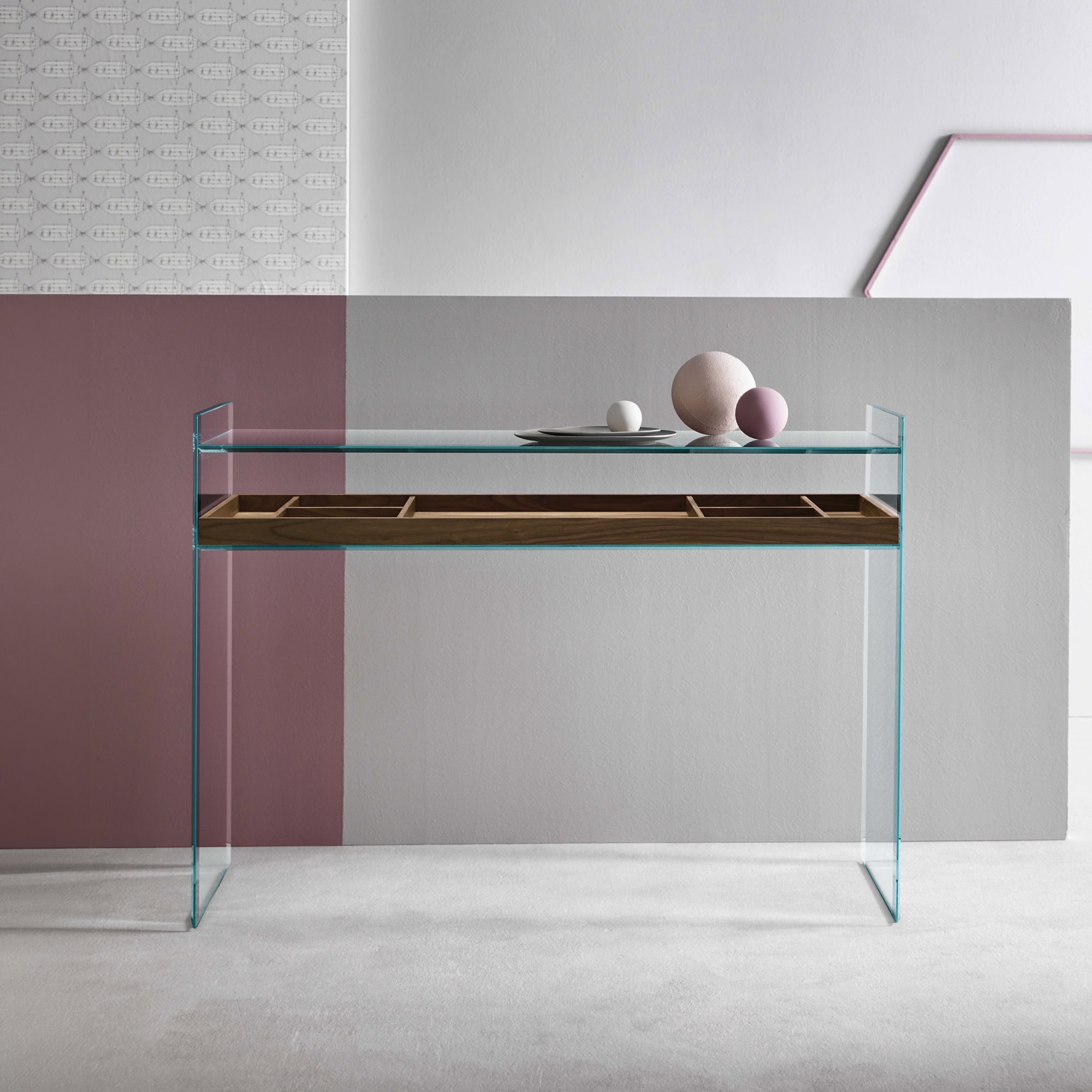 Glass console table with wooden shelf for modern home decor.