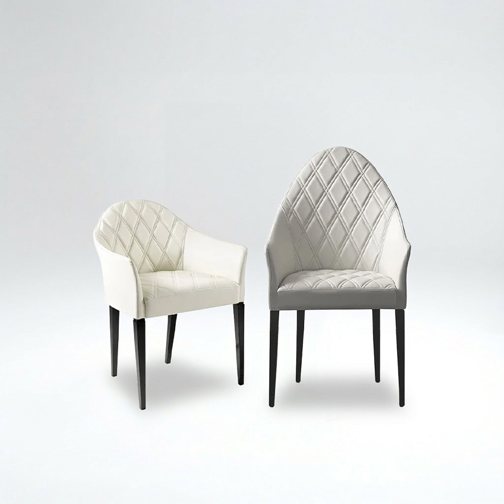 Luxurious modern chairs with quilted diamond pattern, perfect for contemporary home decor.