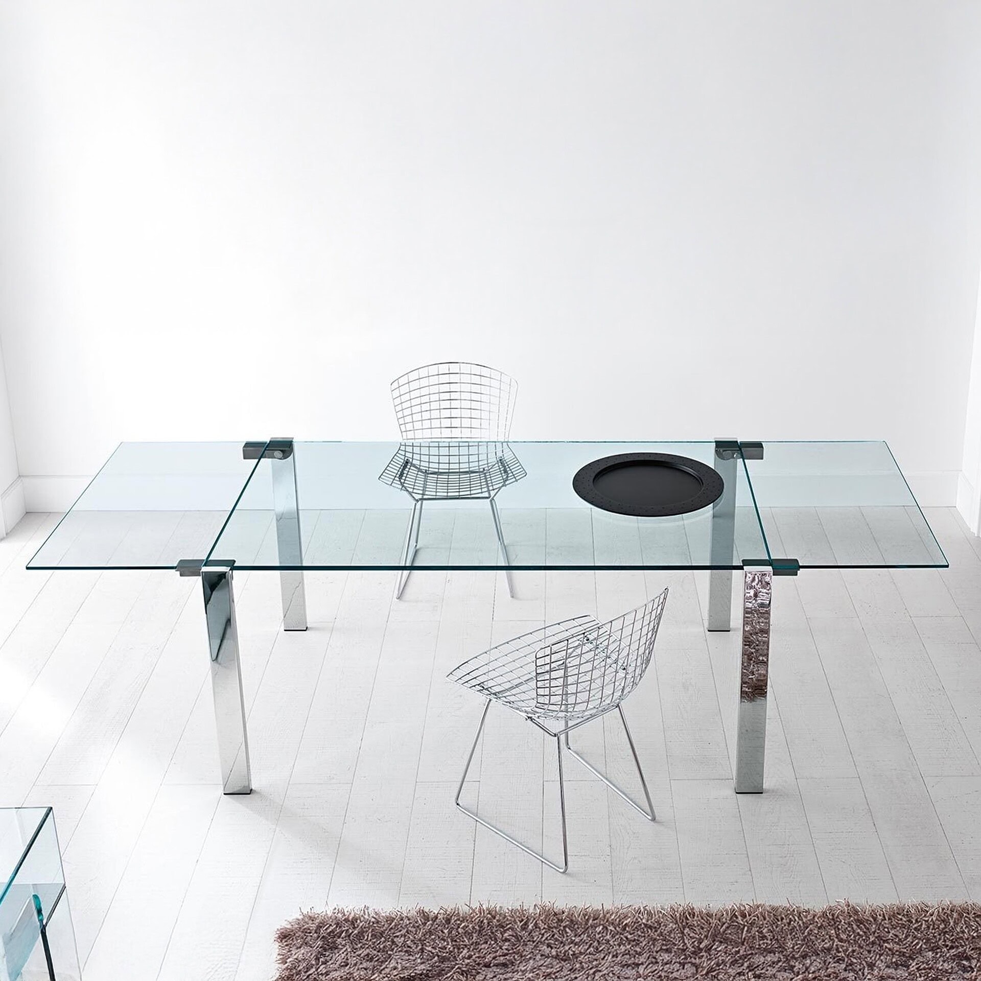 Close-up of the Livingstone Dining Table extension mechanism with extra clear glass top