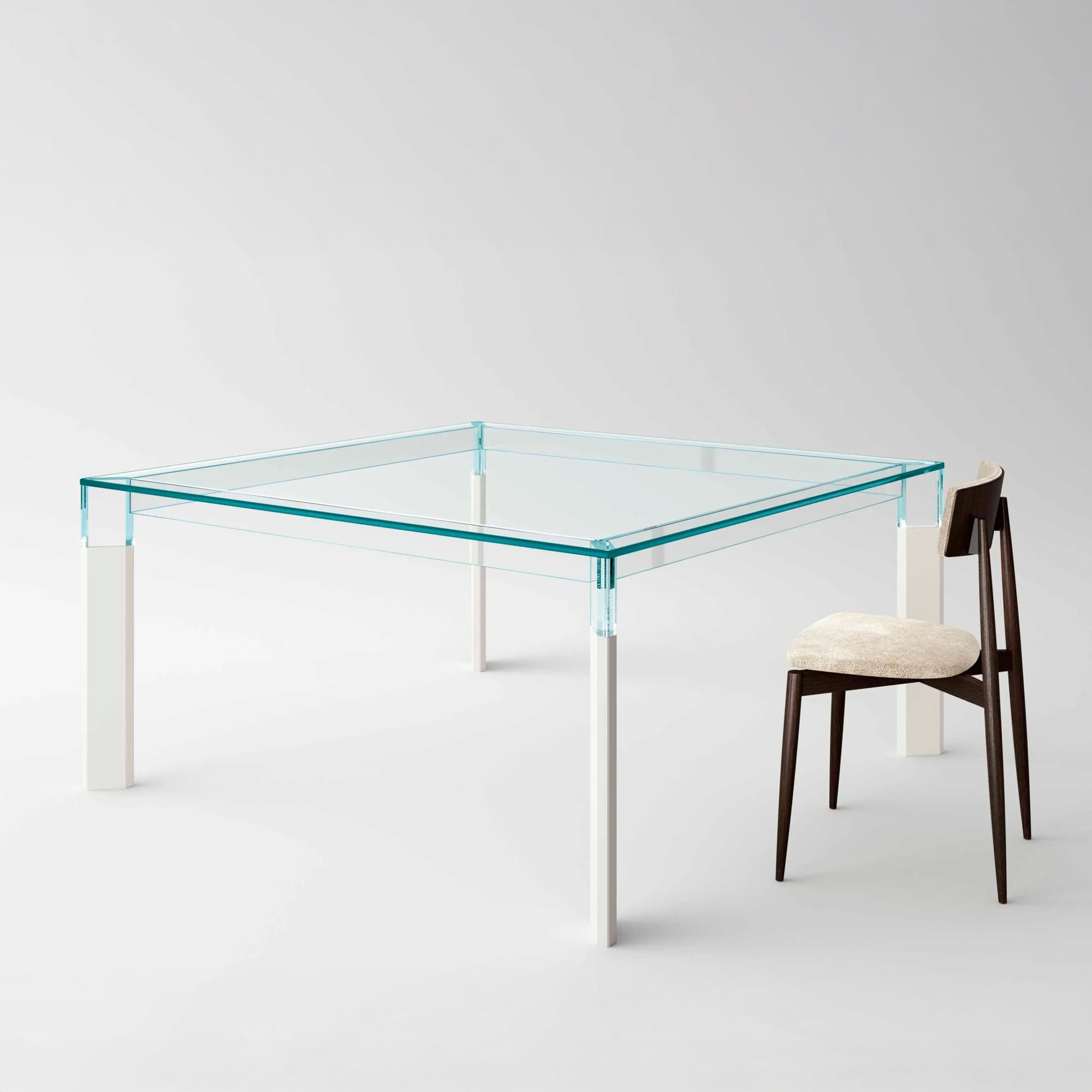 Perseo Extra-Clear Glass Dining Table styled with a modern dining chair