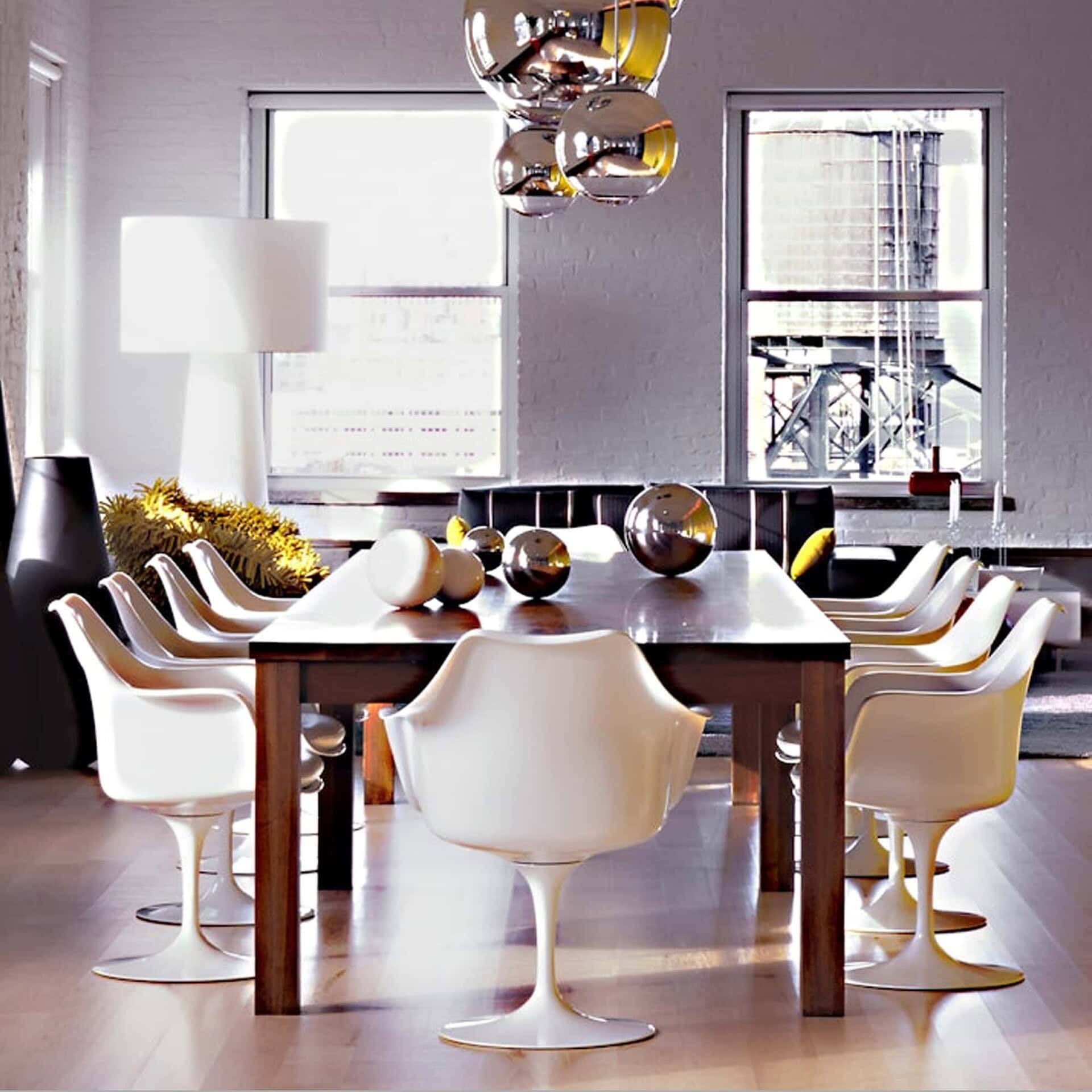 a dining room with a table and chairs