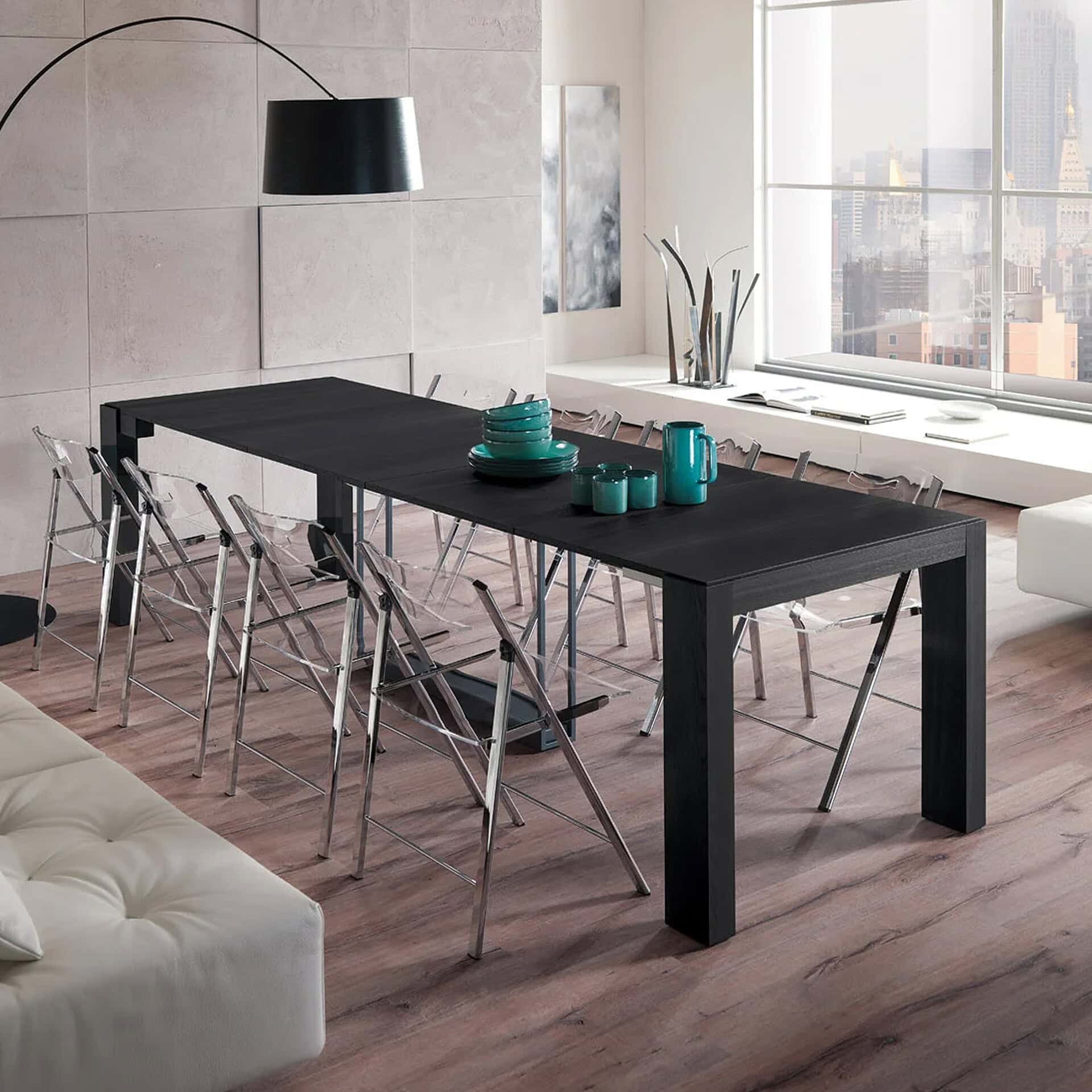 Extendable black console table for modern dining or living spaces. Perfect for versatile use and sty.