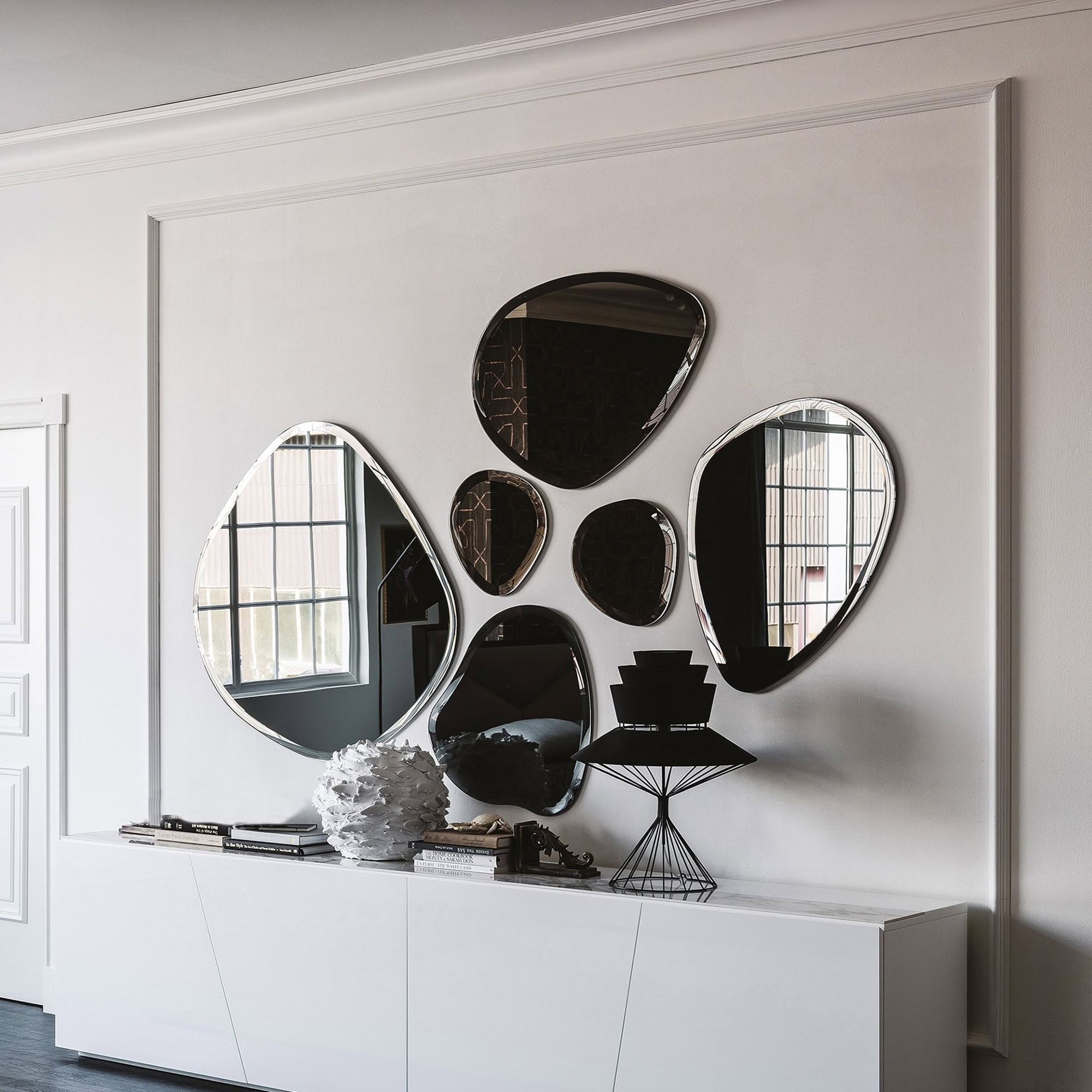 Hawaii Sculpted Wall Mirrors displayed in a modern white living room arrangement.