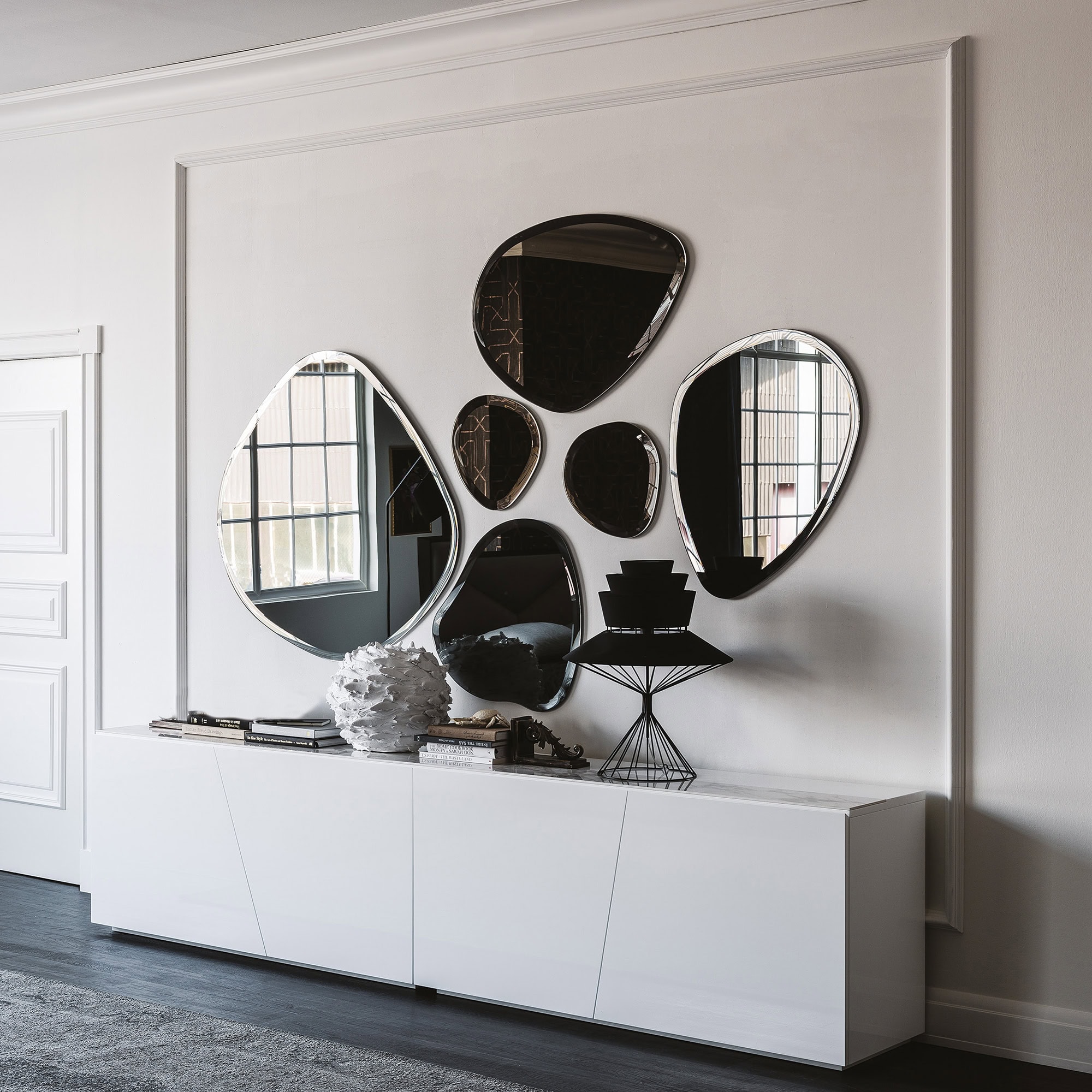 Hawaii Sculpted Wall Mirrors displayed in a modern white living room arrangement.