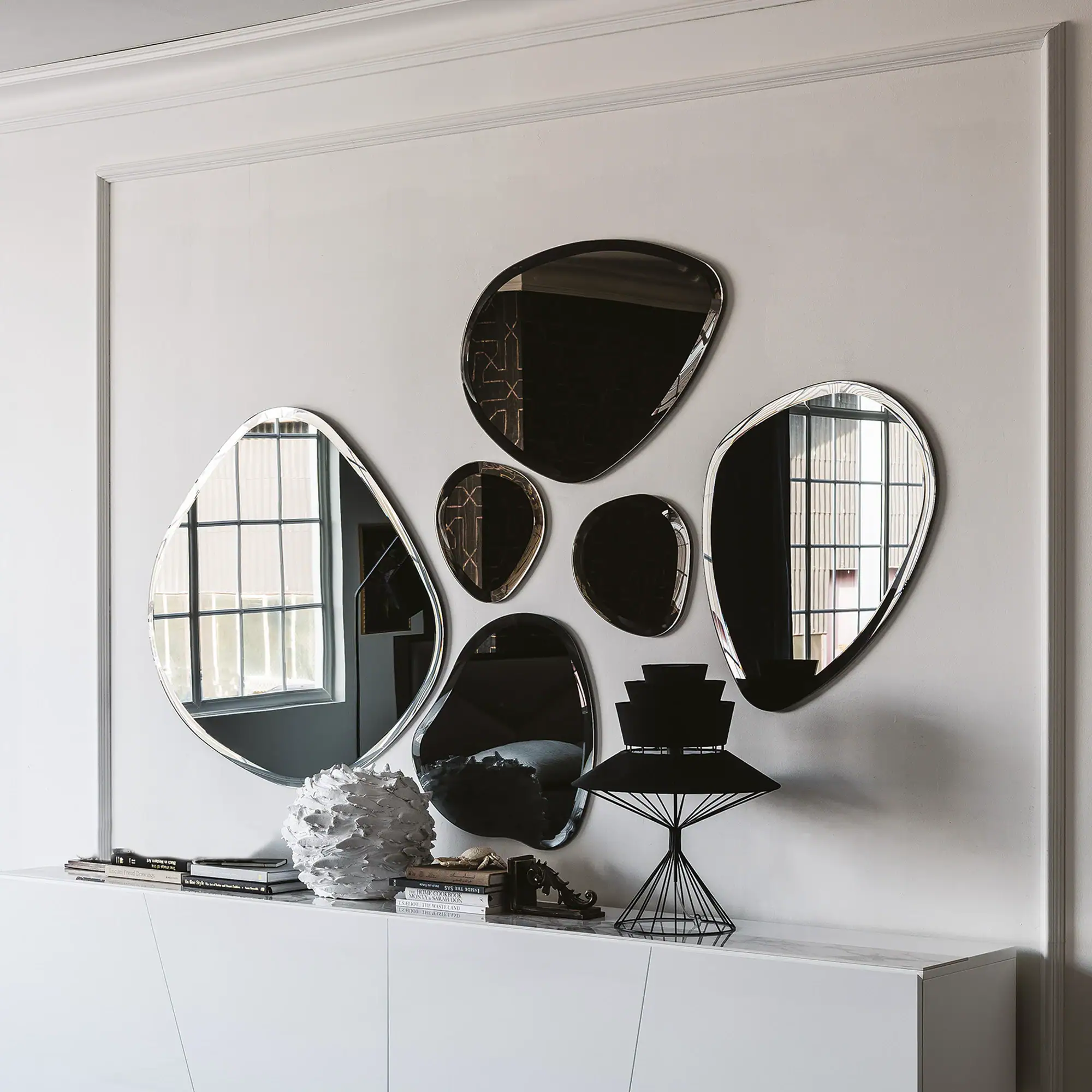Hawaii Sculpted Wall Mirrors displayed in a modern white living room arrangement.