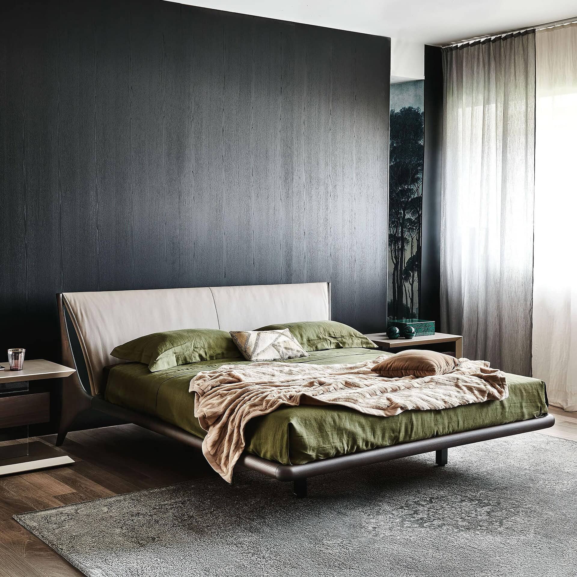 Nelson Wood Frame Upholstered Bed in white leather with walnut frame, styled in a contemporary bedroom with dark accent wall.