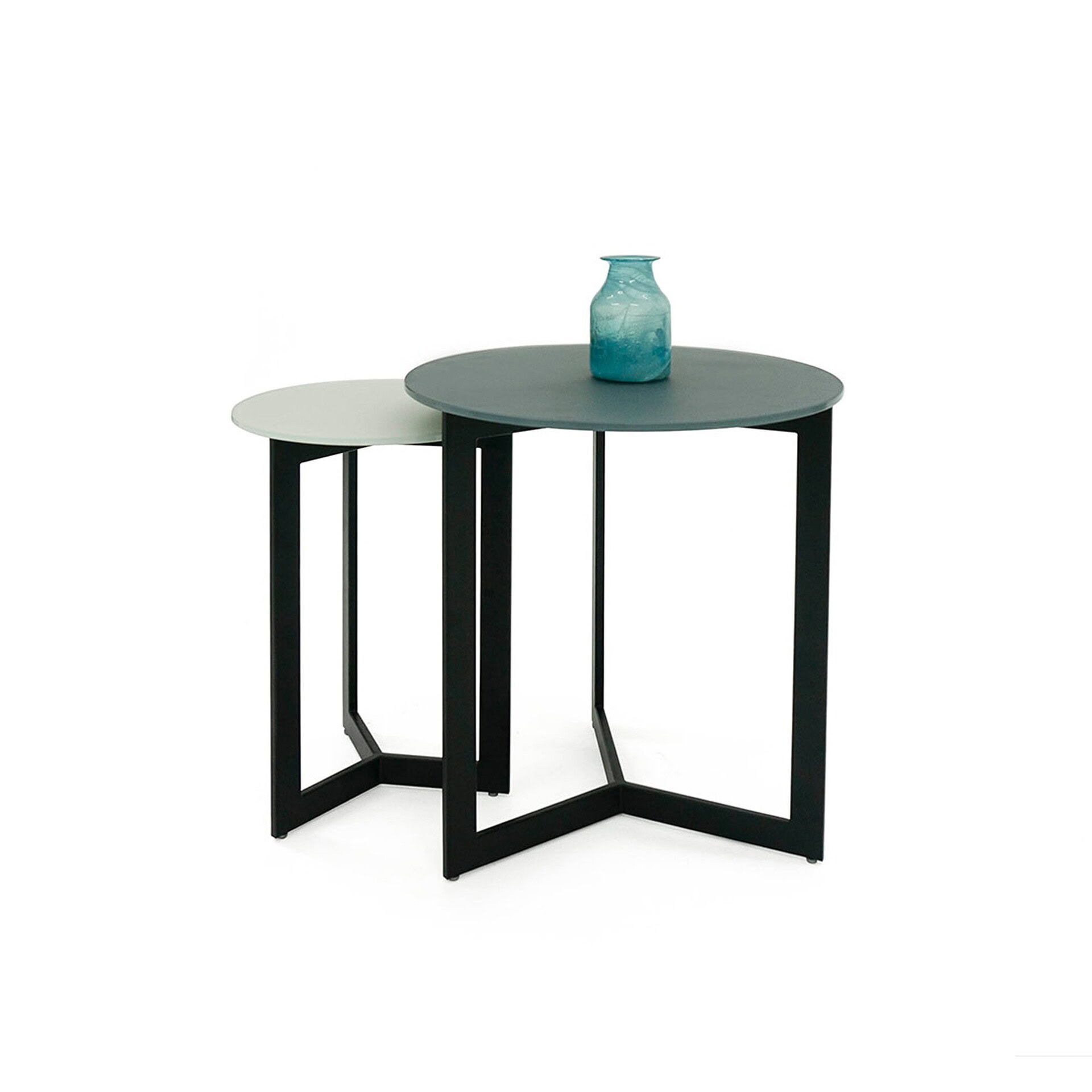 Drei Side Tables in black metal finish with glass tops, styled together with a decorative vase.