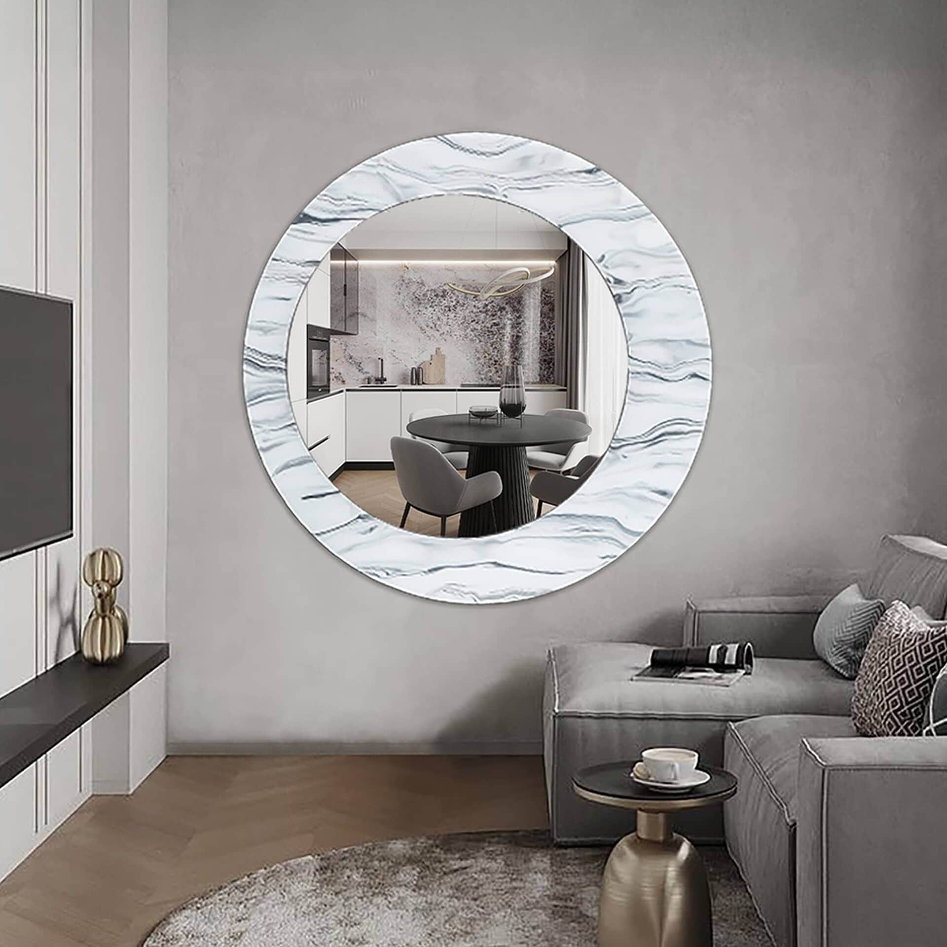 Olio Mirror with clear textured glass frame displayed above a sofa in a neutral-toned living room.