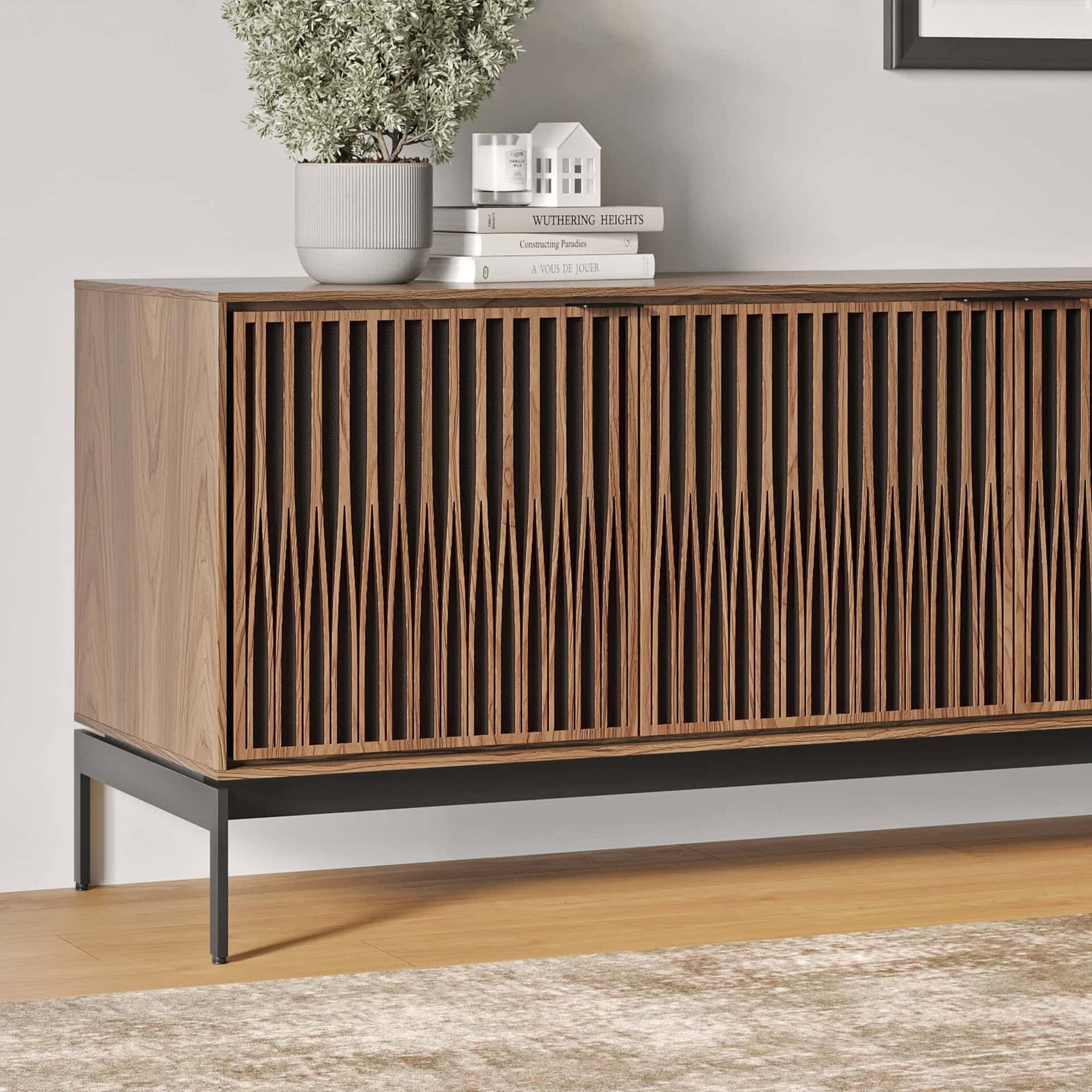 Dark wood slatted sideboard with metal legs in a modern interior setting.