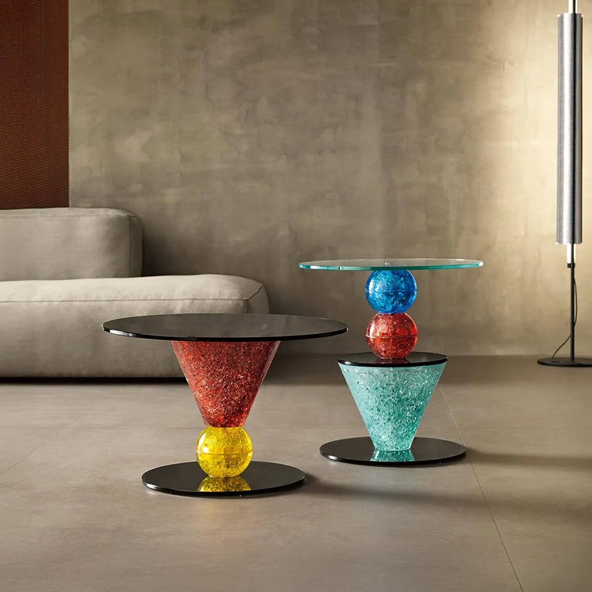 Il Paese delle Meraviglie Side Tables styled in a living room setting, colorful glass bases with round glass tops