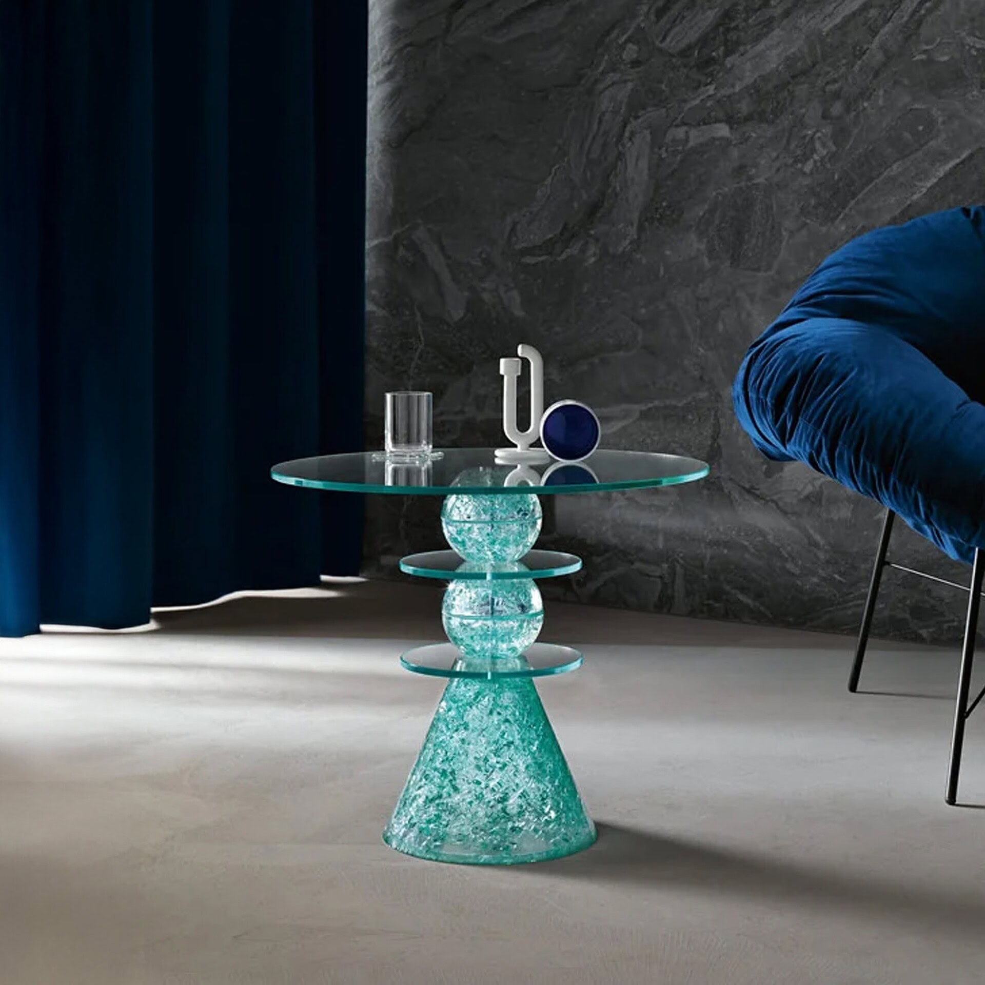 Il Paese delle Meraviglie Side Table with turquoise glass base and clear round glass top, shown in contemporary interior