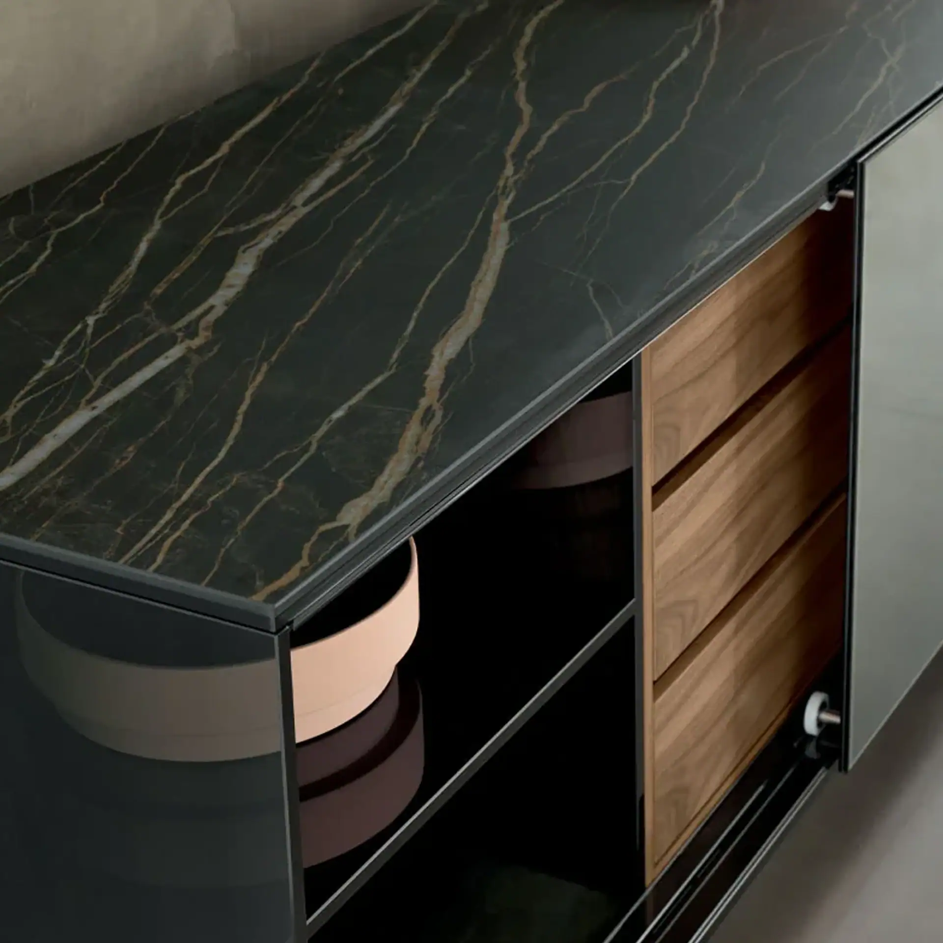 Sklar Furnishings sideboard with marble top and wooden drawers in a modern room.