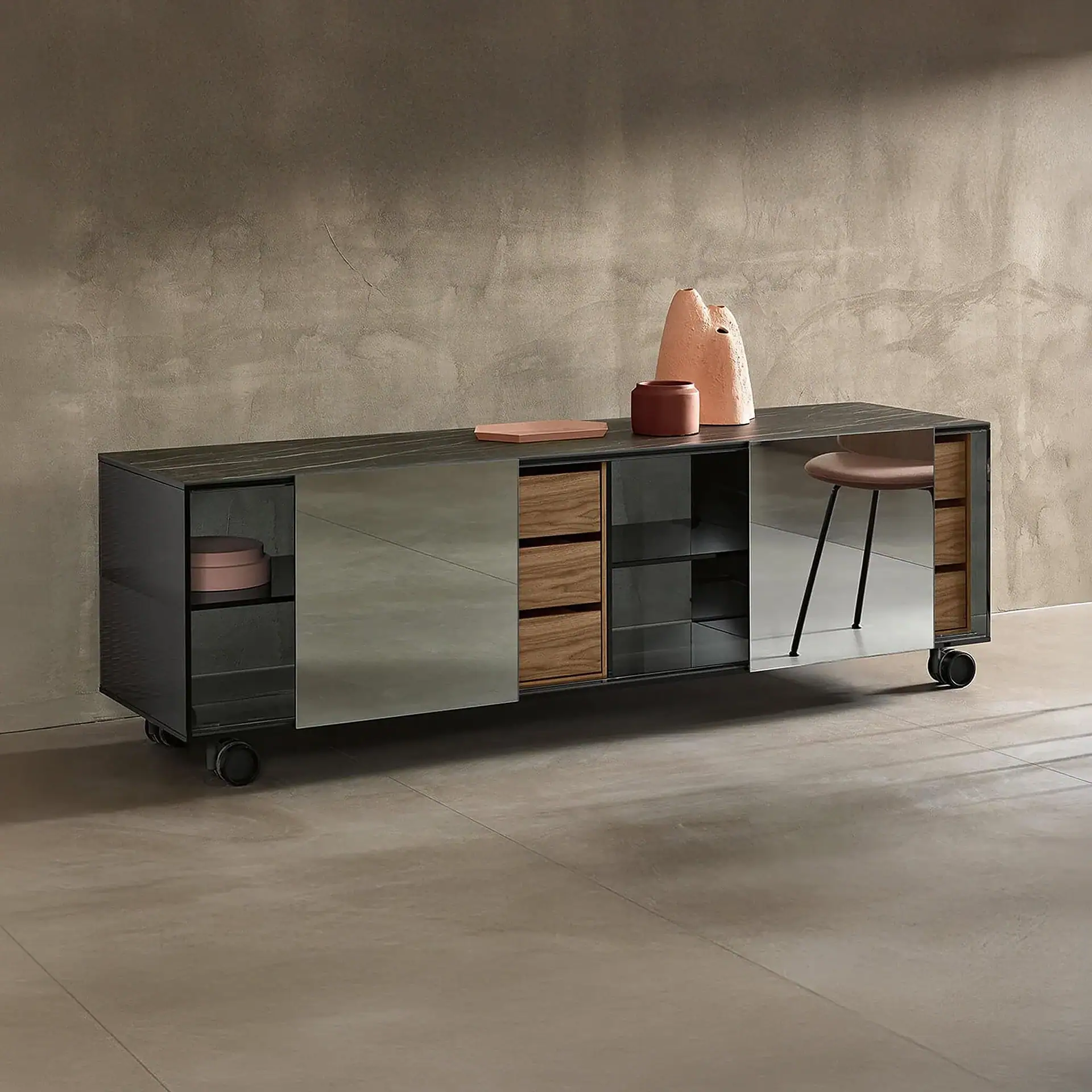 Sklar Furnishings sideboard with mirrored doors and wooden accents in a modern room.
