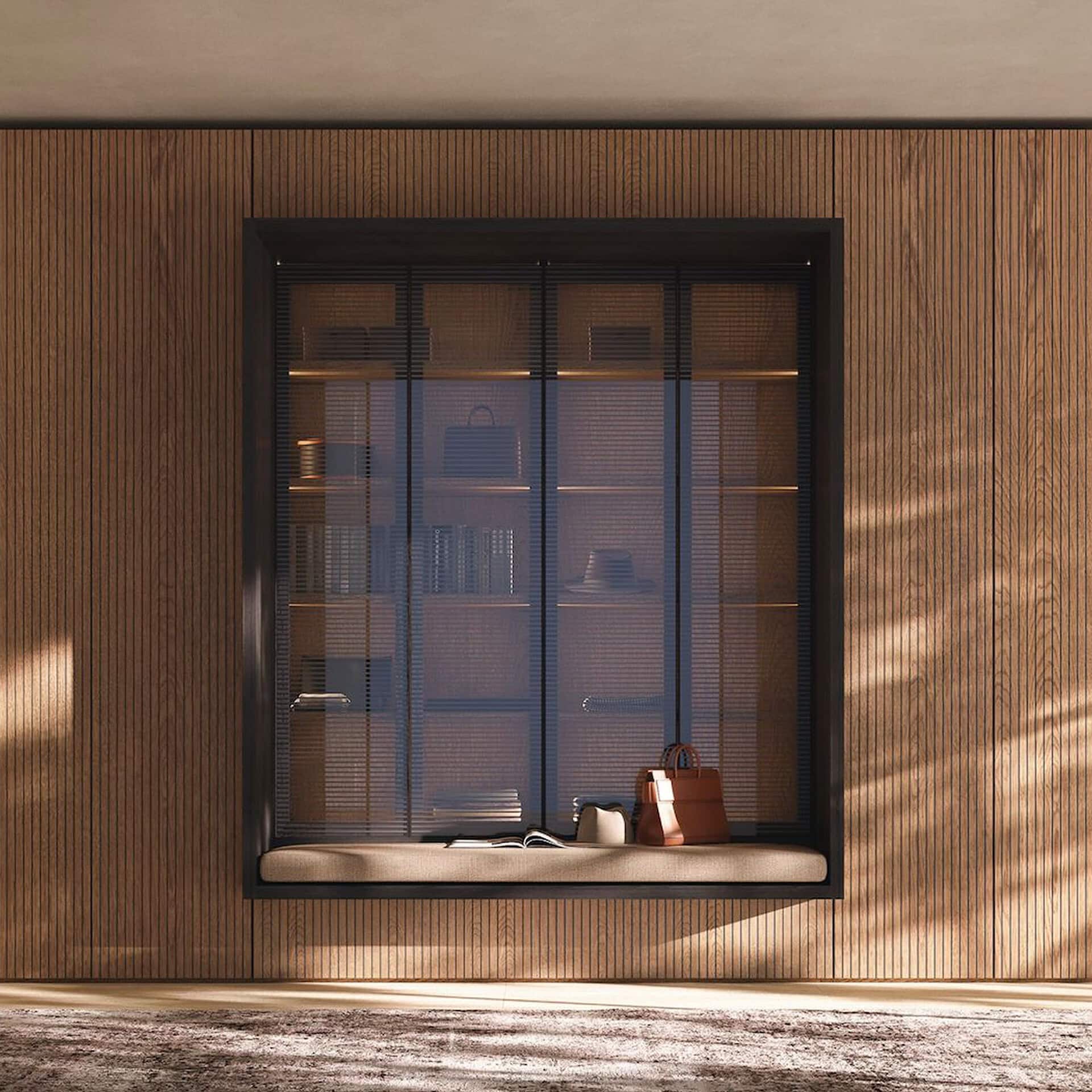 Modern window display with stylish bags and books at Sklar Furnishings.