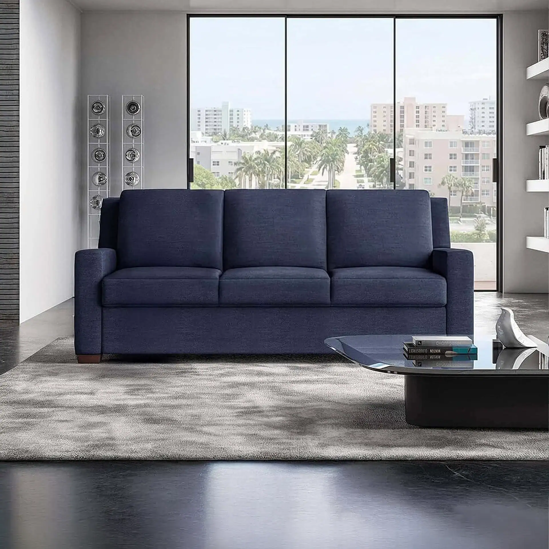 Lyons Comfort Sleeper Sofa in modern apartment with city skyline view.