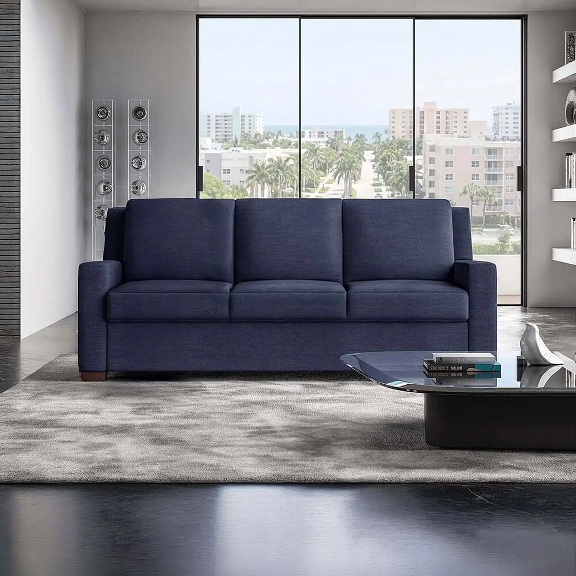 Lyons Comfort Sleeper Sofa in modern apartment with city skyline view.