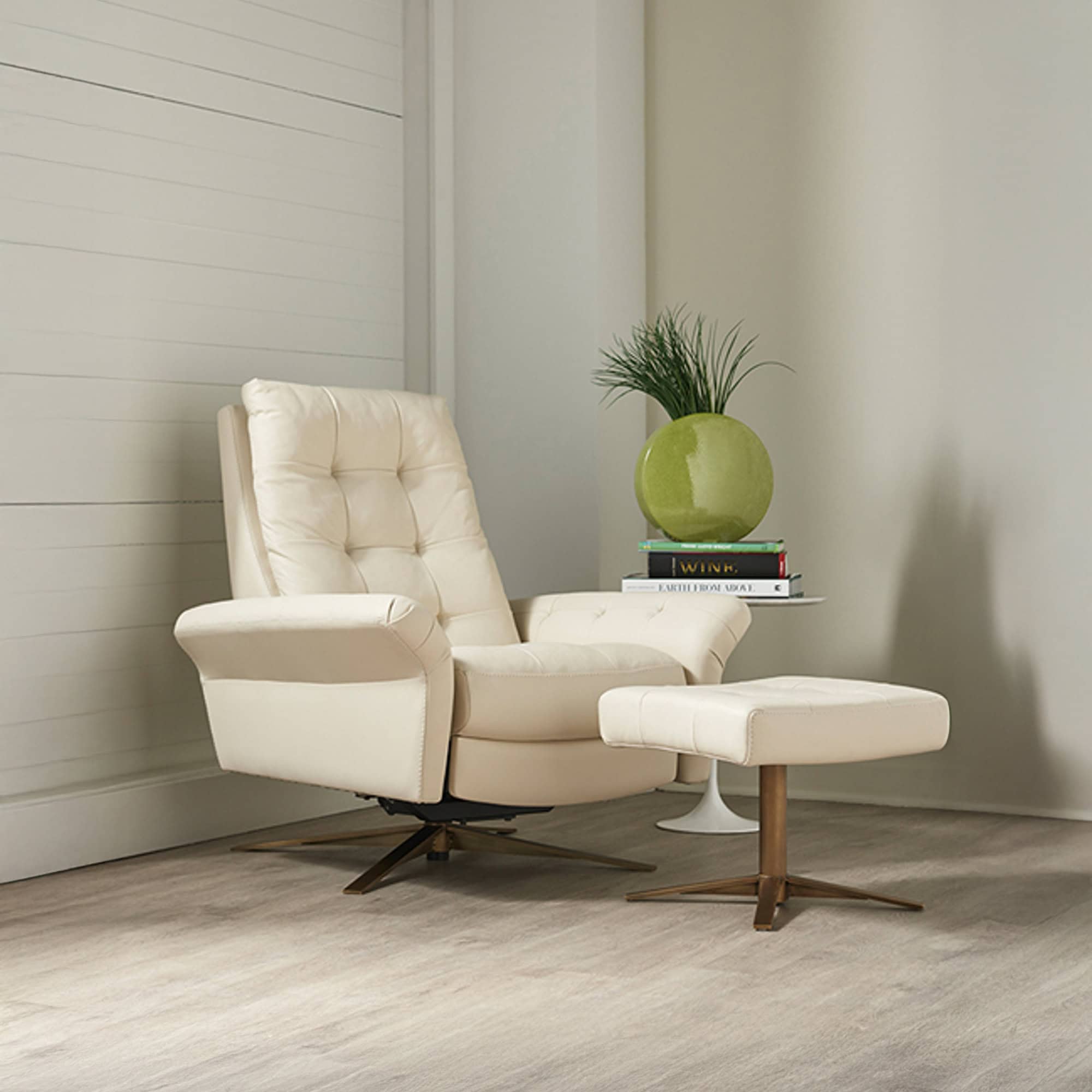 Lifestyle view of Pileus Comfort Air Chair in cream upholstery with wood disc base, styled in a modern interior.