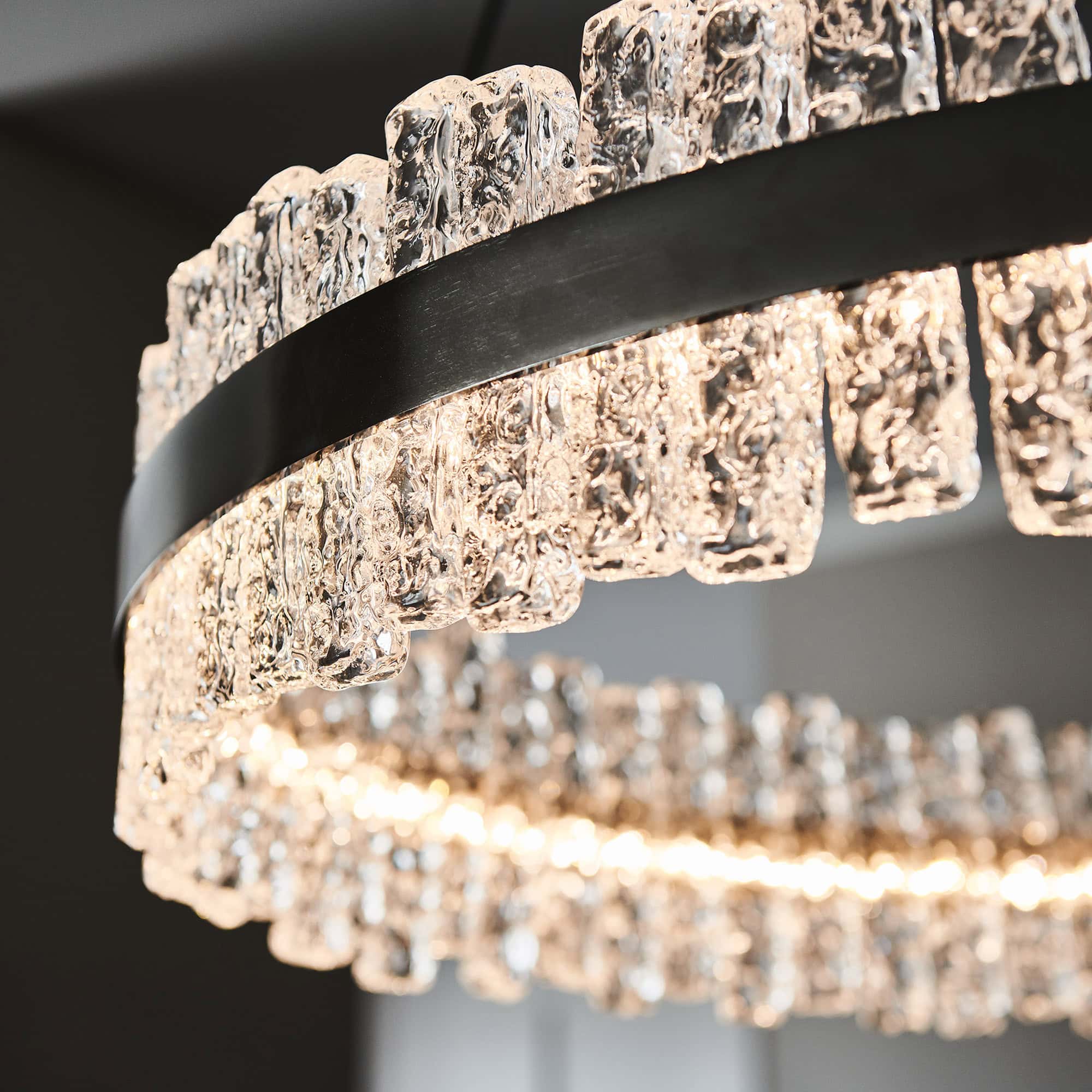 Close-up of Phoenix LED Handmade Glass Chandelier showing handmade glass details and satin nickel frame.