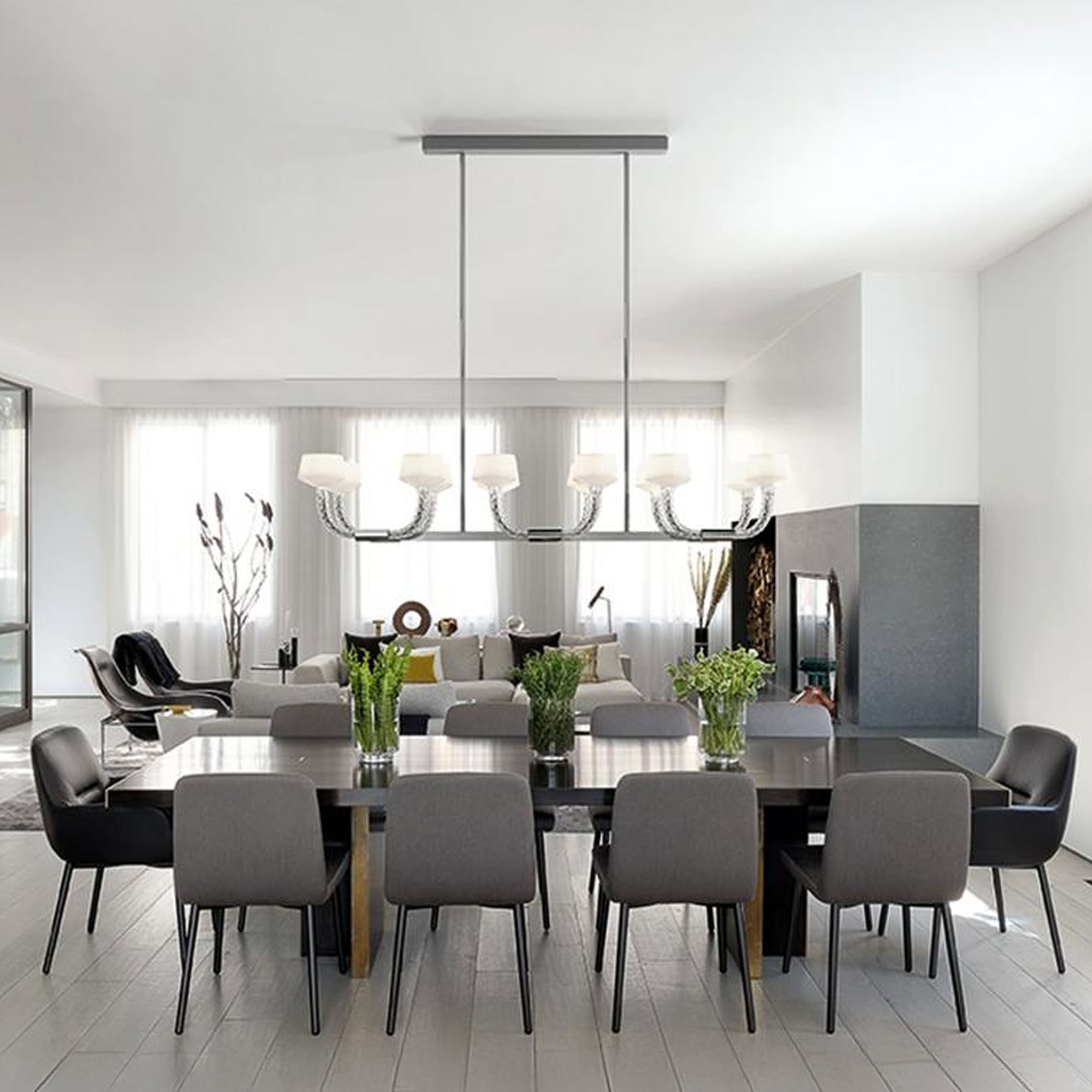 Twins chandelier showcased in a bright dining room setting, frontal perspective.