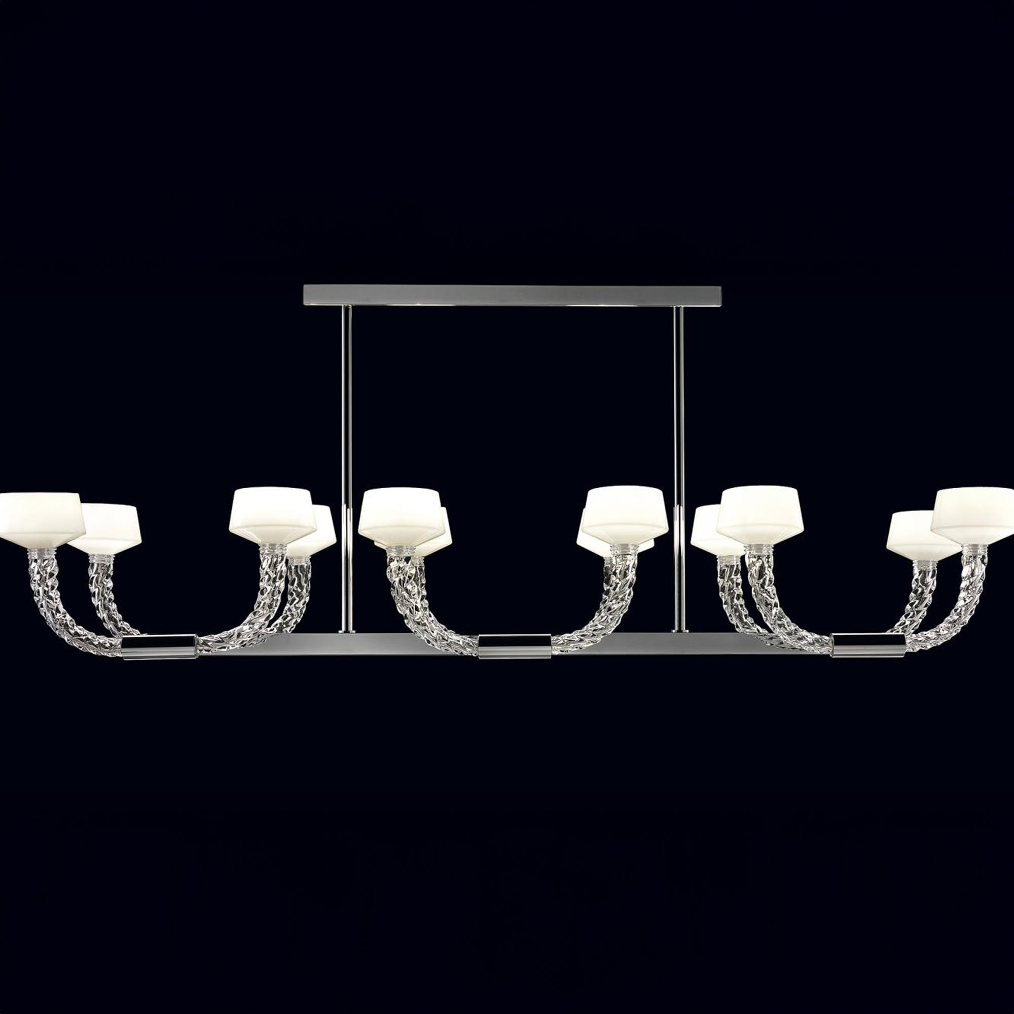 Wide front view of Twins chandelier suspended in a dark setting.