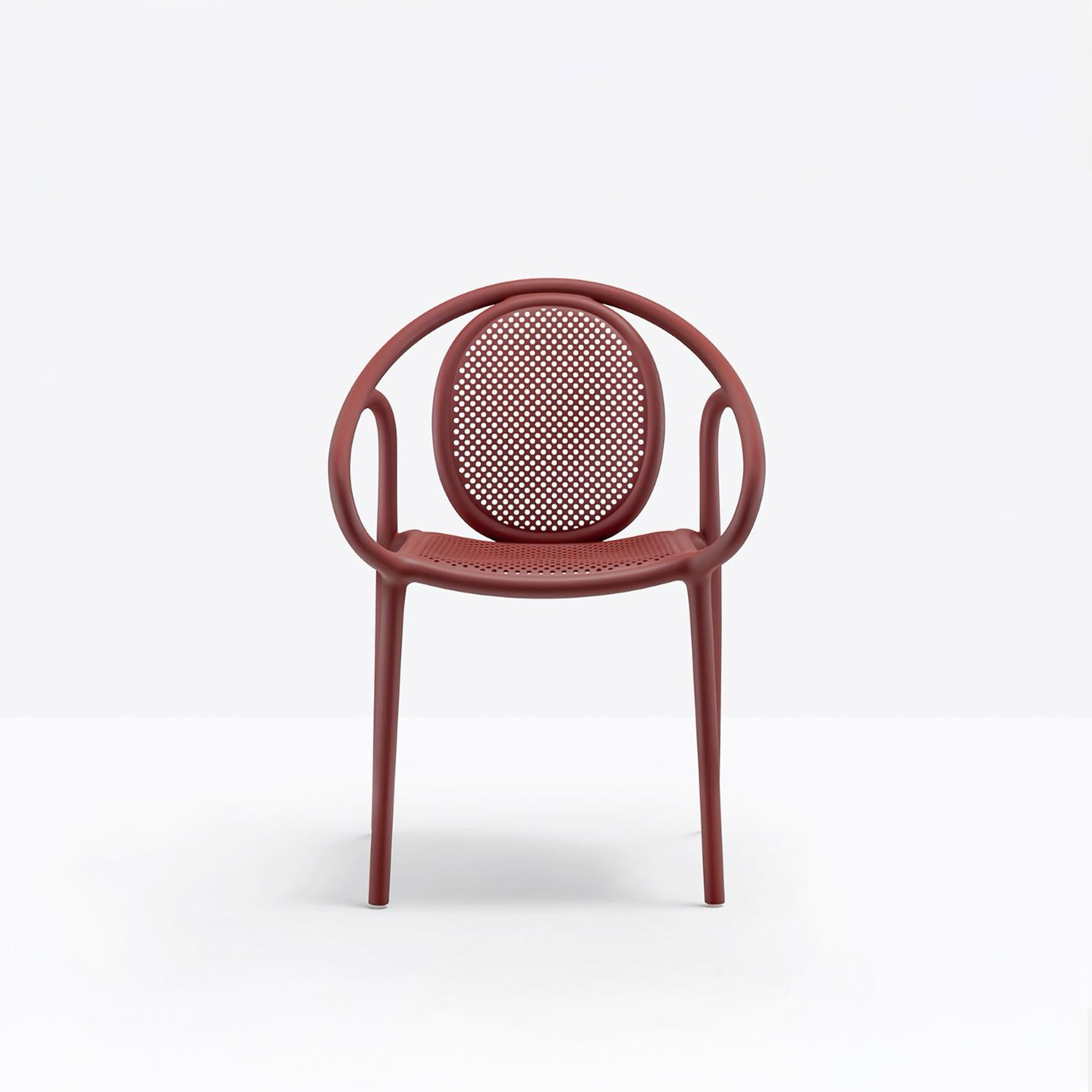 Pedrali Remind 3735 Armchair in red polypropylene with perforated backrest, front view