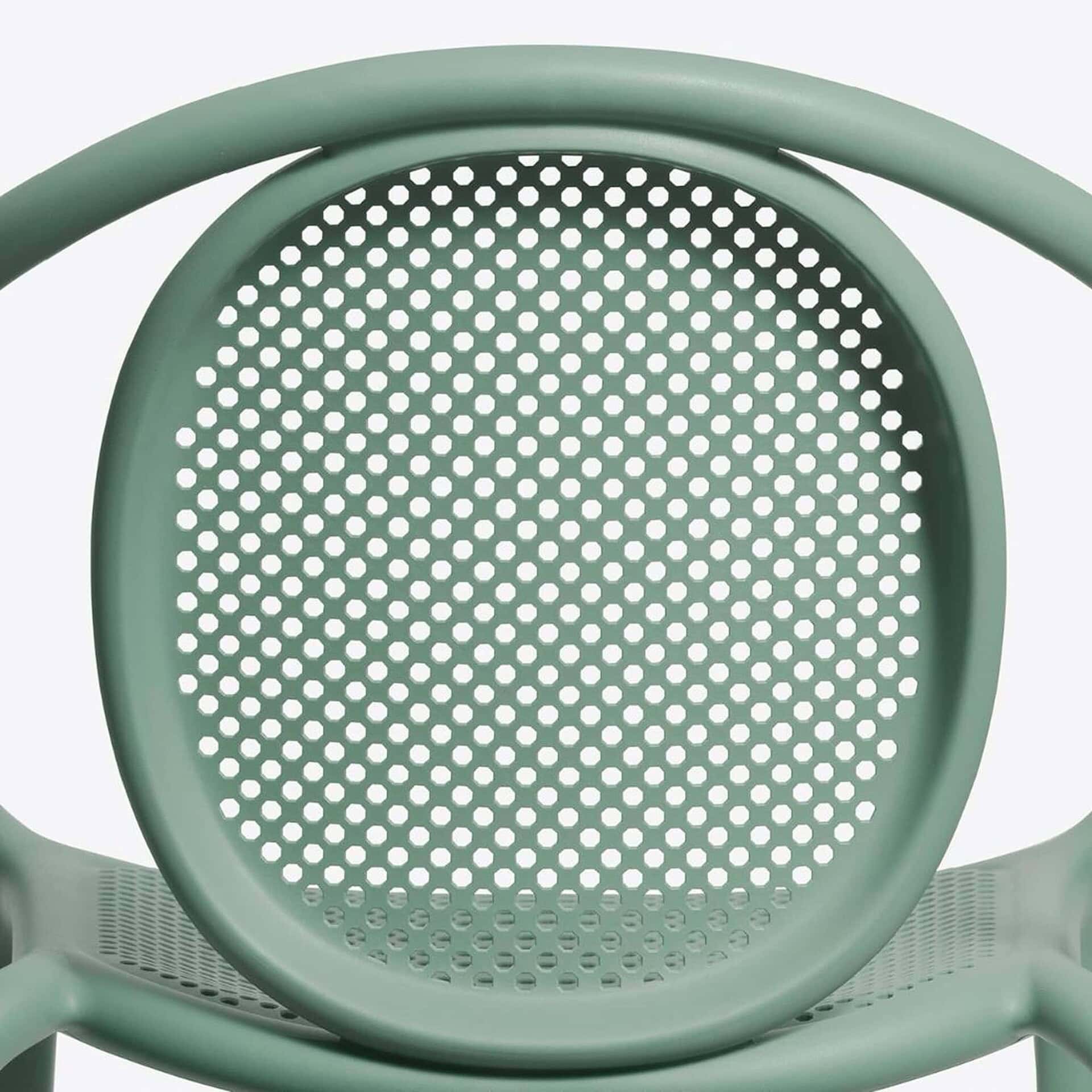 Detail view of Pedrali Remind 3735 Armchair seat and perforated polypropylene backrest in green