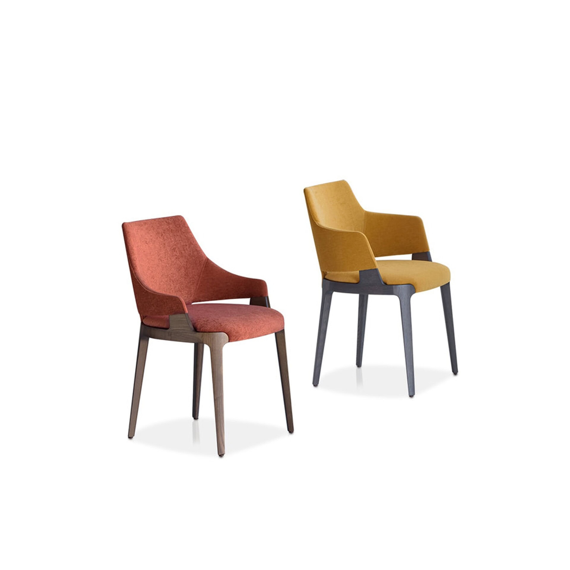 Upholstered dining chairs with vibrant fabric cushions and sleek wooden legs for modern home decor.