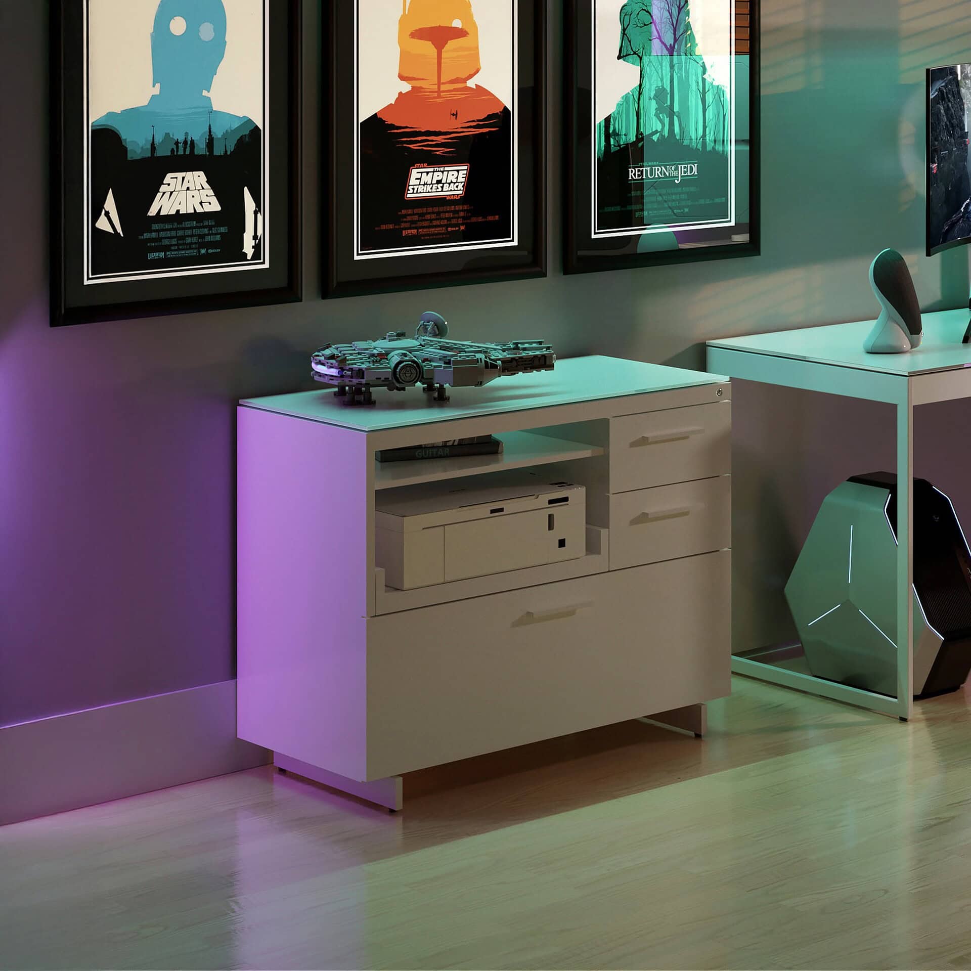 Colorful modern gaming setup with white furniture, LEGO spaceship, and Star Wars posters for a stylish interior design.