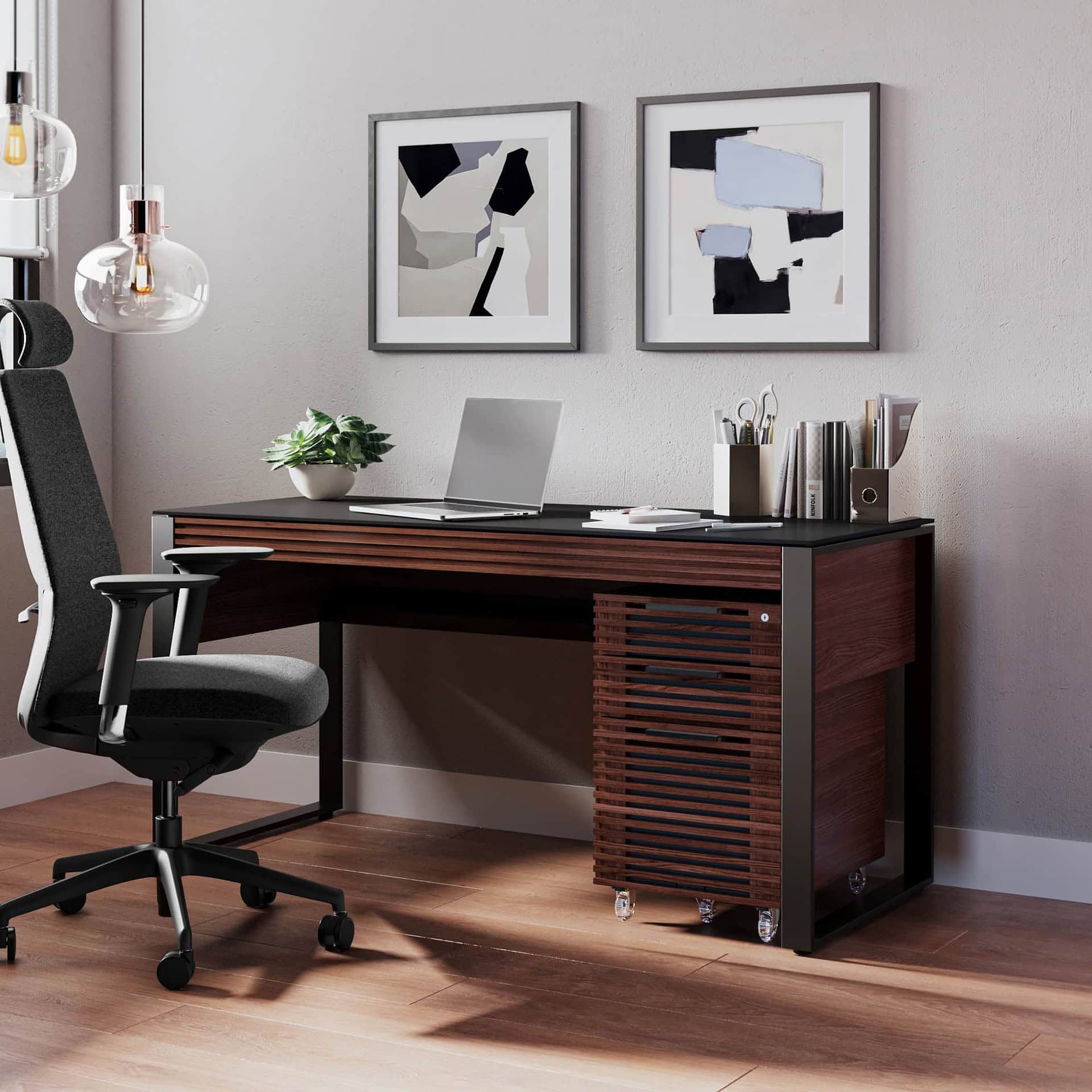 Sleek modern office desk with wood and black accents, perfect for professional workspaces.