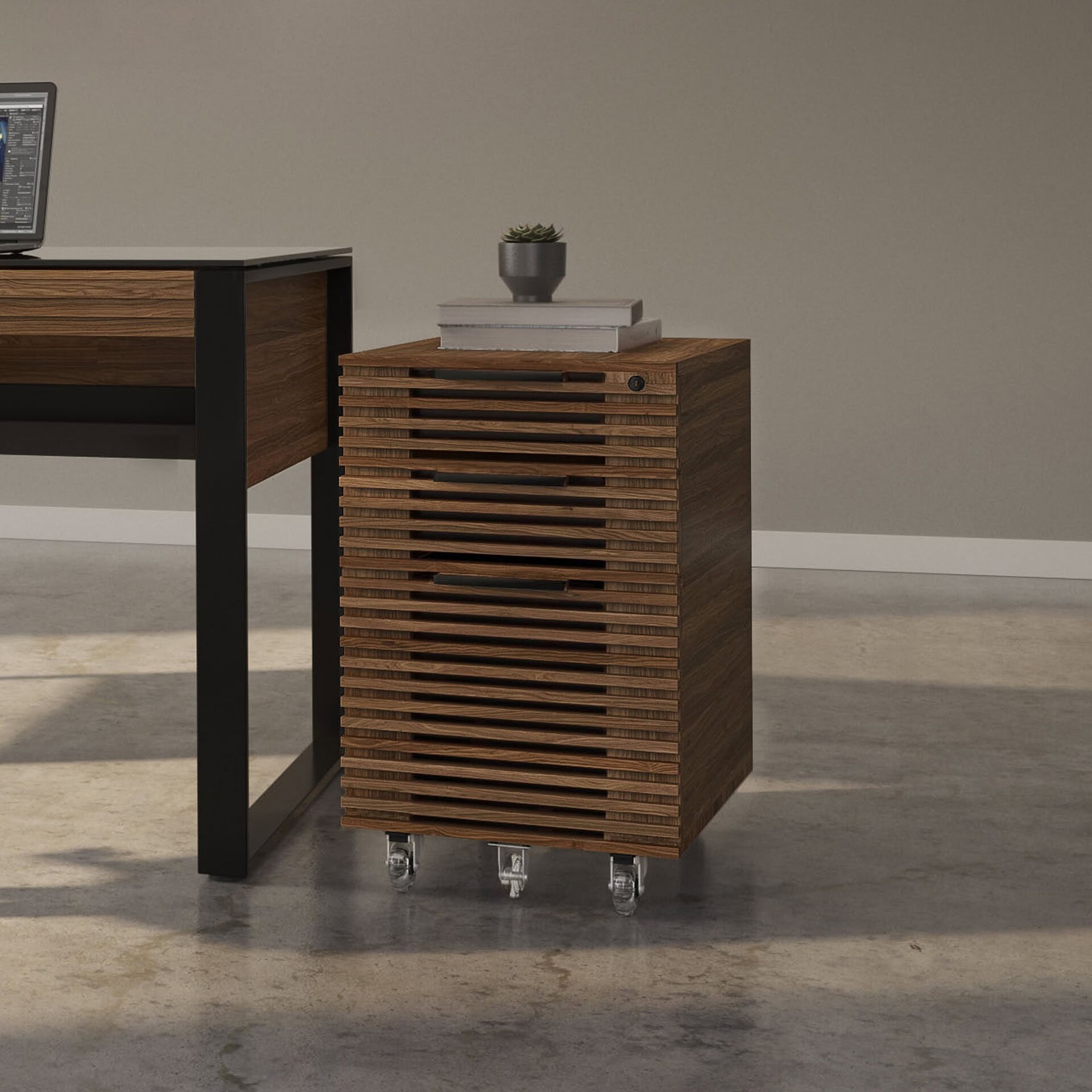 Handcrafted wooden mobile storage cabinet with slatted design and casters for easy mobility.